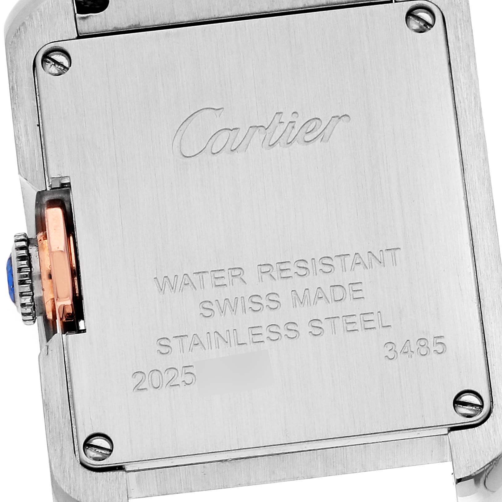 The image shows the back case of a Cartier Tank Anglaise W5310036 Women's Steel and Gold (two tone) Silver Dial W5310036 Women's Steel and Gold (two tone) Silver Dial watch, including its crown and engraved details.