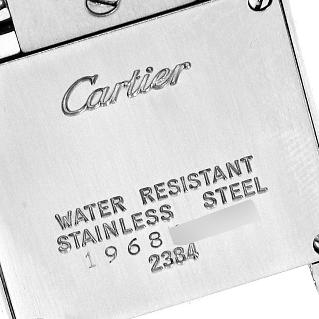This image shows the back case of a Tank Francaise watch by Cartier, highlighting details such as the brand, water resistance, and material.