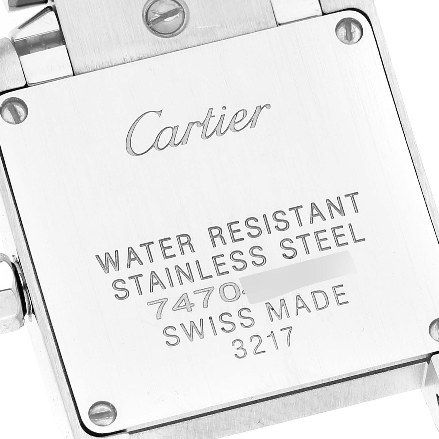 This image shows the back casing of a Cartier Tank Francaise W51008Q3 Women's Stainless Steel Silver Dial W51008Q3 Women's Stainless Steel Silver Dial model watch, including screws, engraving, and water resistance information.