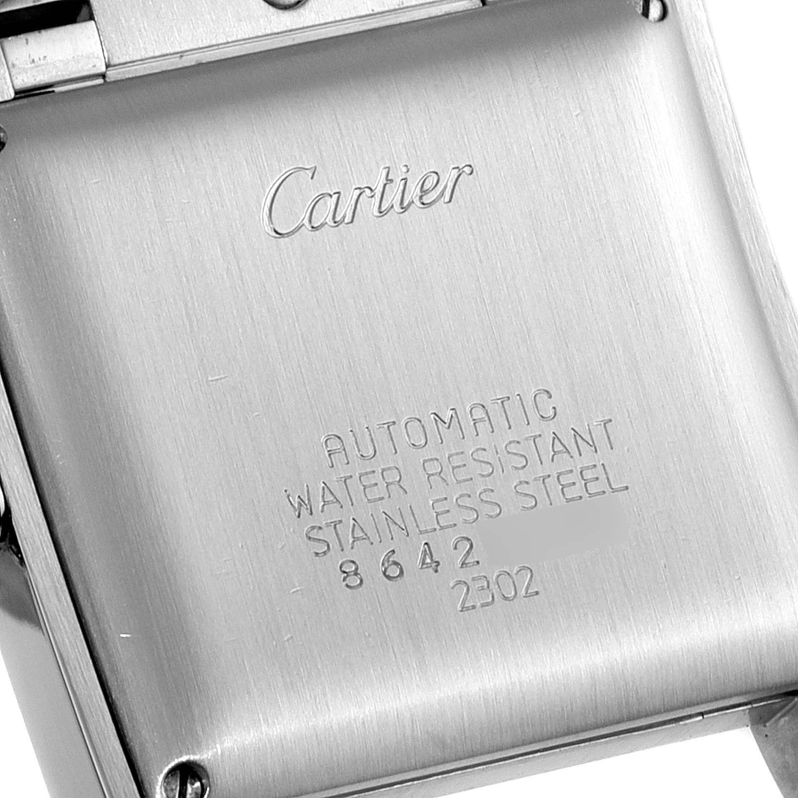 The image shows the case back of a Cartier Tank Francaise W51005Q4 Men's Steel and Gold (two tone) Silver Dial W51005Q4 Men's Steel and Gold (two tone) Silver Dial watch displaying its engraved specifications.