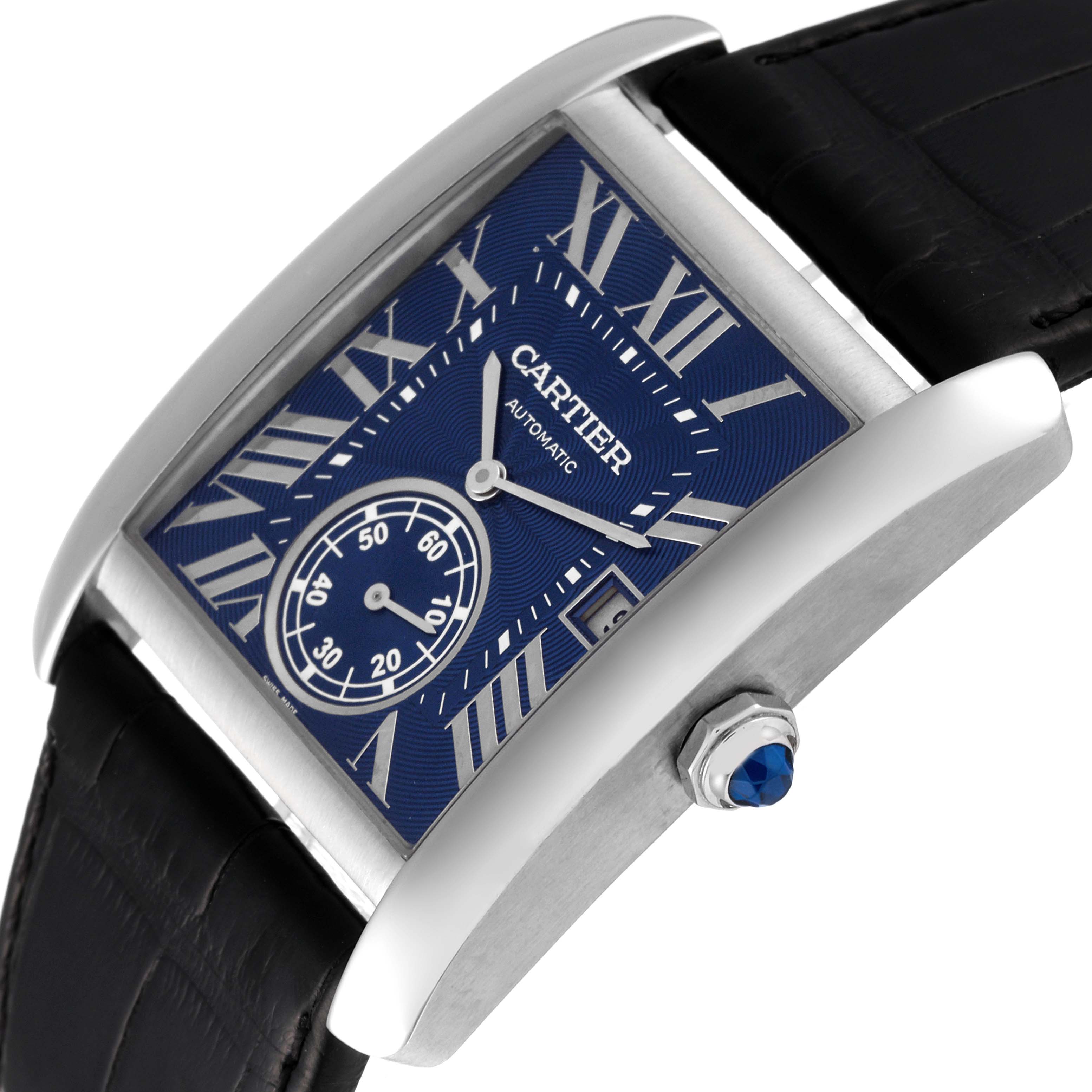 The Cartier Tank MC WSTA0010 Men's Stainless Steel Blue Dial WSTA0010 Men's Stainless Steel Blue Dial watch is displayed at an angle revealing the blue dial, Roman numerals, subdial, and crown with a blue gem.