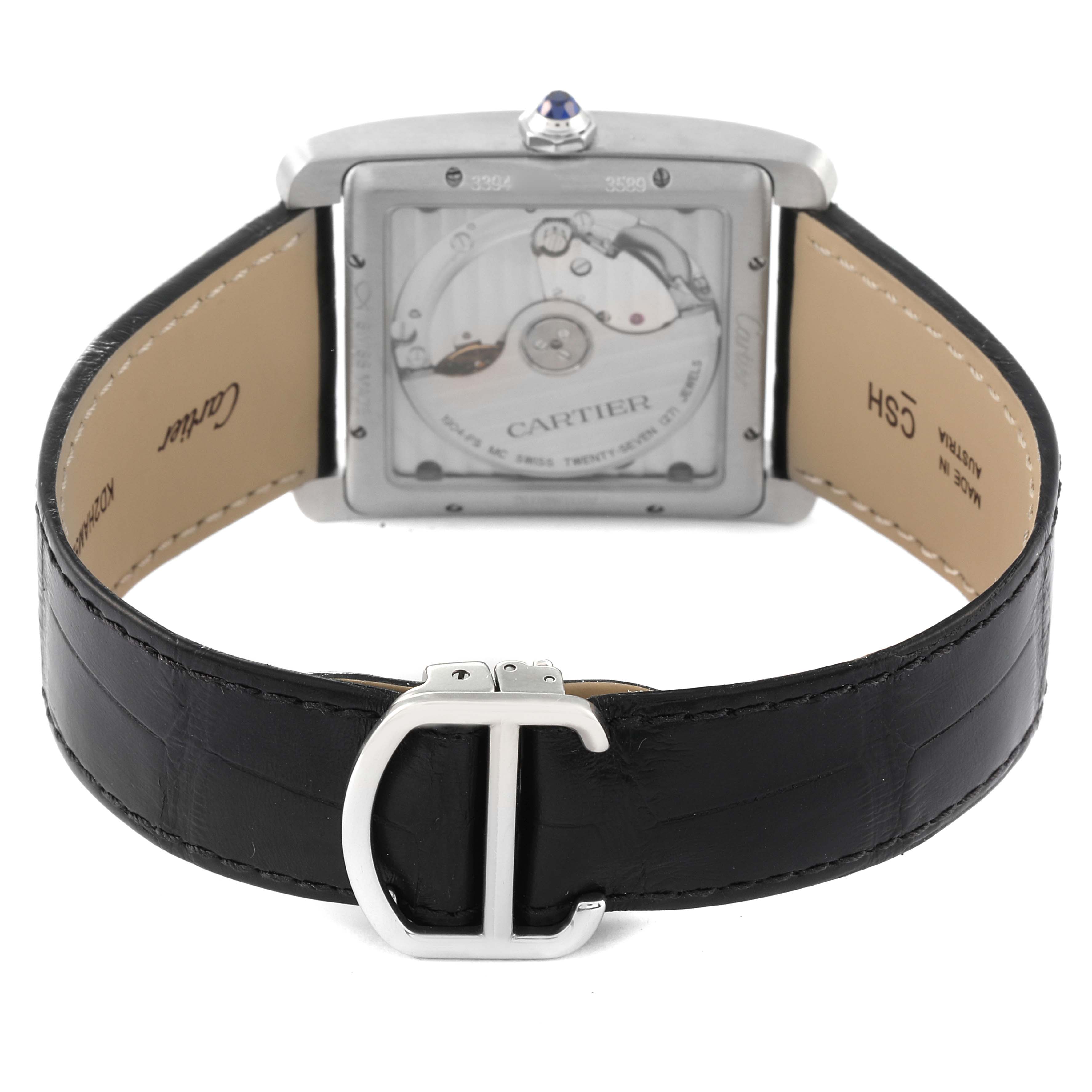 This image shows the back of the Cartier Tank MC WSTA0010 Men's Stainless Steel Blue Dial WSTA0010 Men's Stainless Steel Blue Dial watch, highlighting its leather strap and mechanical movement.