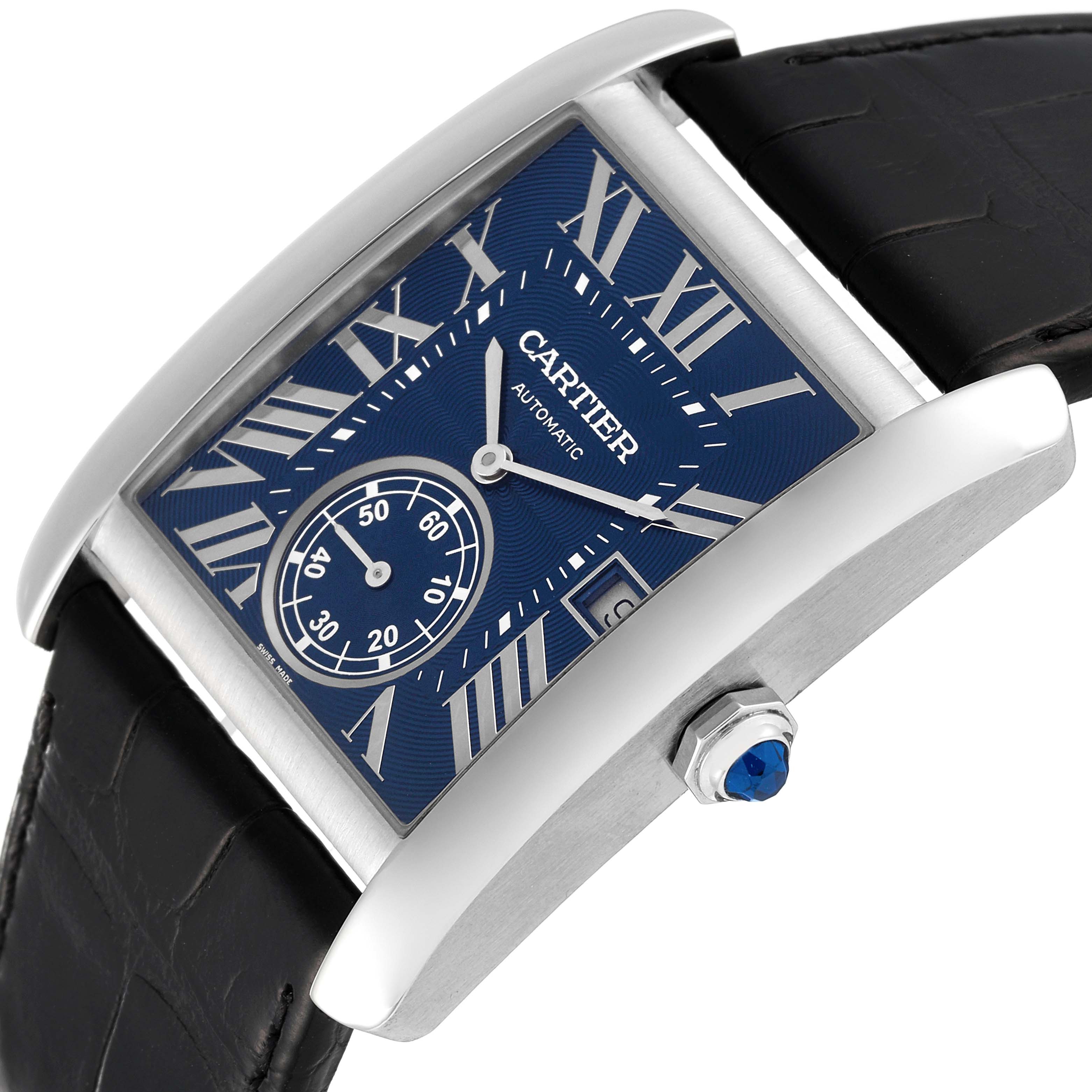 The image shows a close-up, angled view of the Cartier Tank MC WSTA0010 Men's Stainless Steel Blue Dial WSTA0010 Men's Stainless Steel Blue Dial watch, highlighting its blue dial, Roman numerals, subdial, and crown.