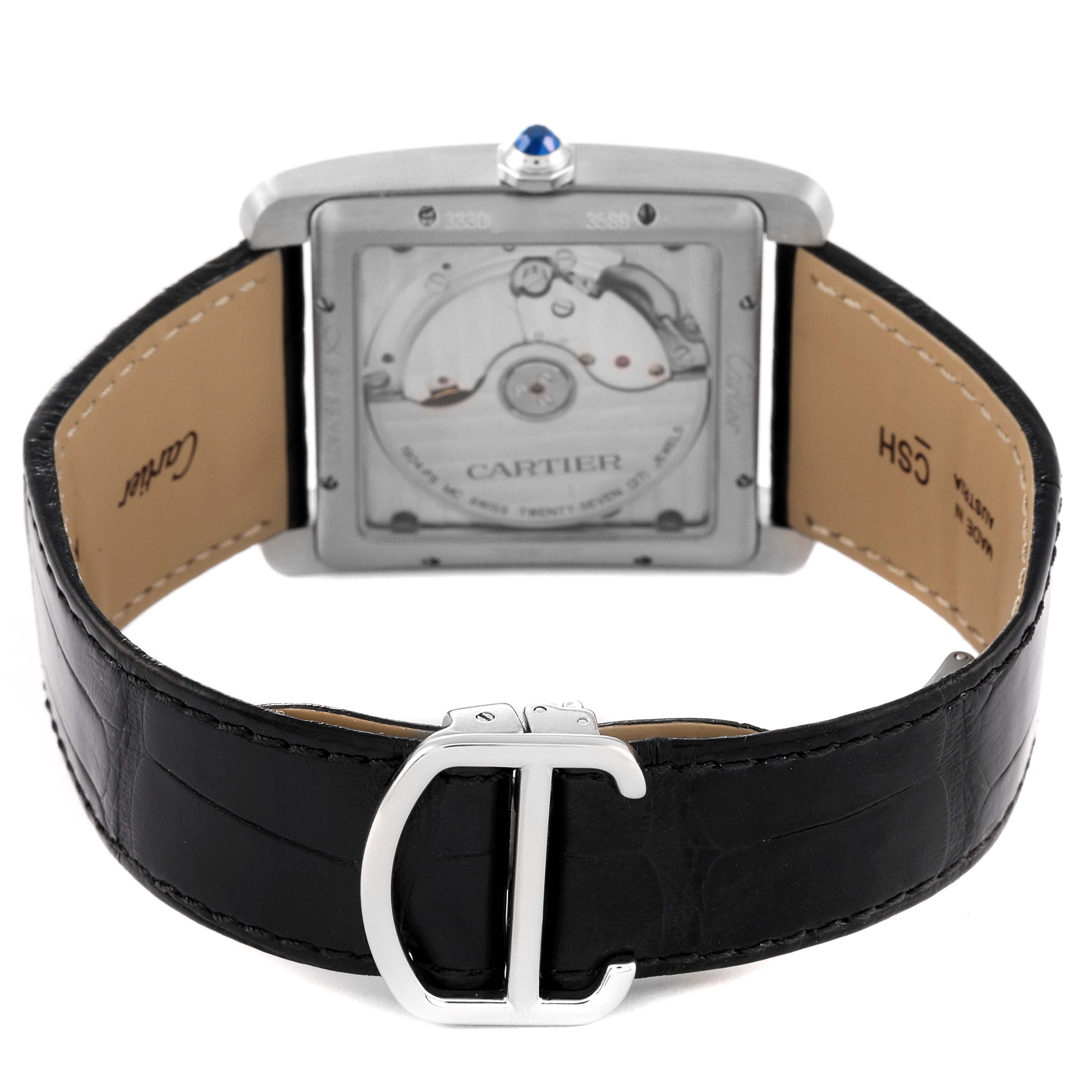 This image shows the back view of the Cartier Tank MC WSTA0010 Men's Stainless Steel Blue Dial WSTA0010 Men's Stainless Steel Blue Dial watch, highlighting its movement and black leather strap with a buckle.