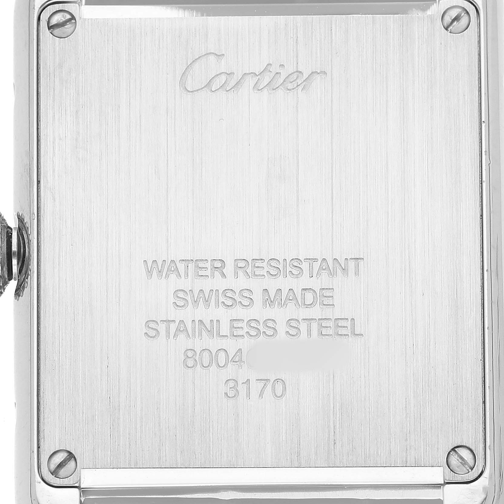 The image shows the back case of a Cartier Tank Solo W5200005 Women's Stainless Steel Silver Dial watch, displaying the brand engraving and specifications.