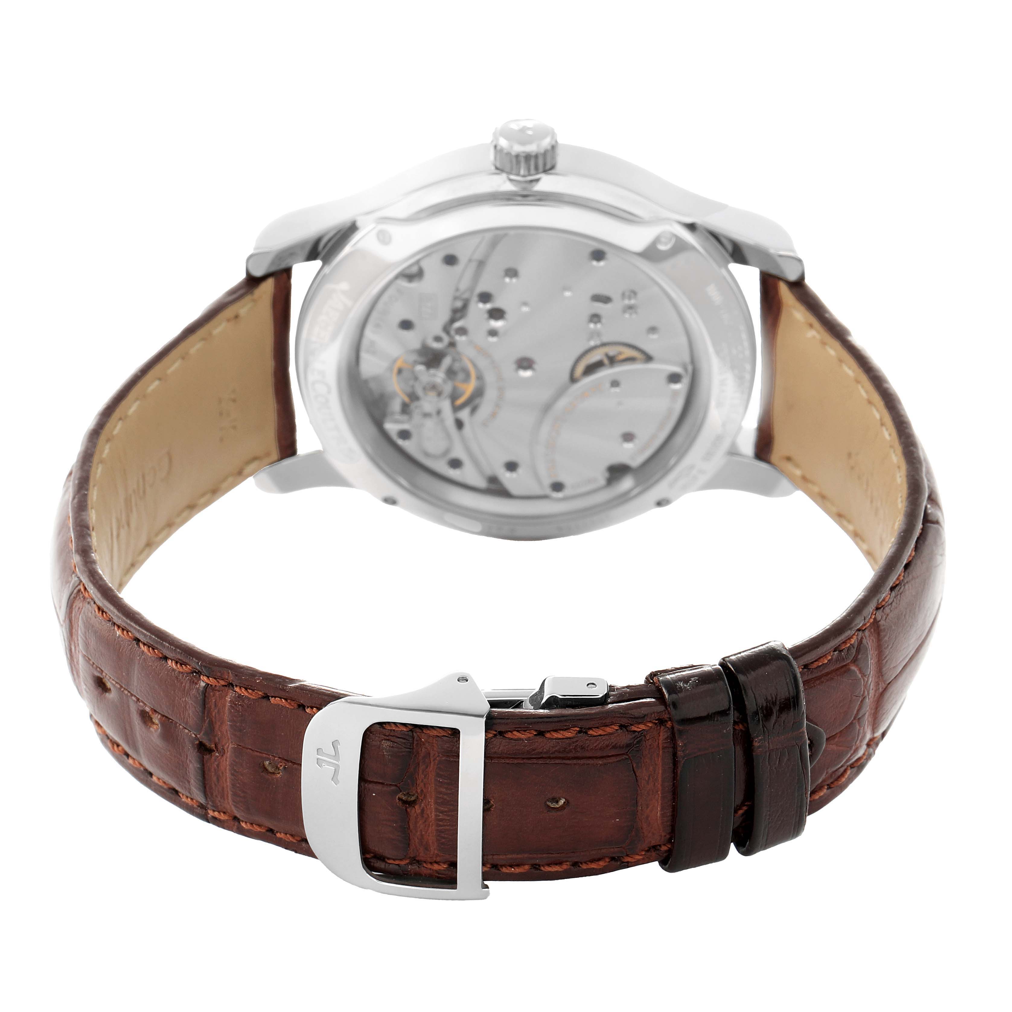 The image shows the back view of a Jaeger LeCoultre Master Q1608420 Men's Stainless Steel Silver Dial model watch, highlighting its movement and brown leather strap.