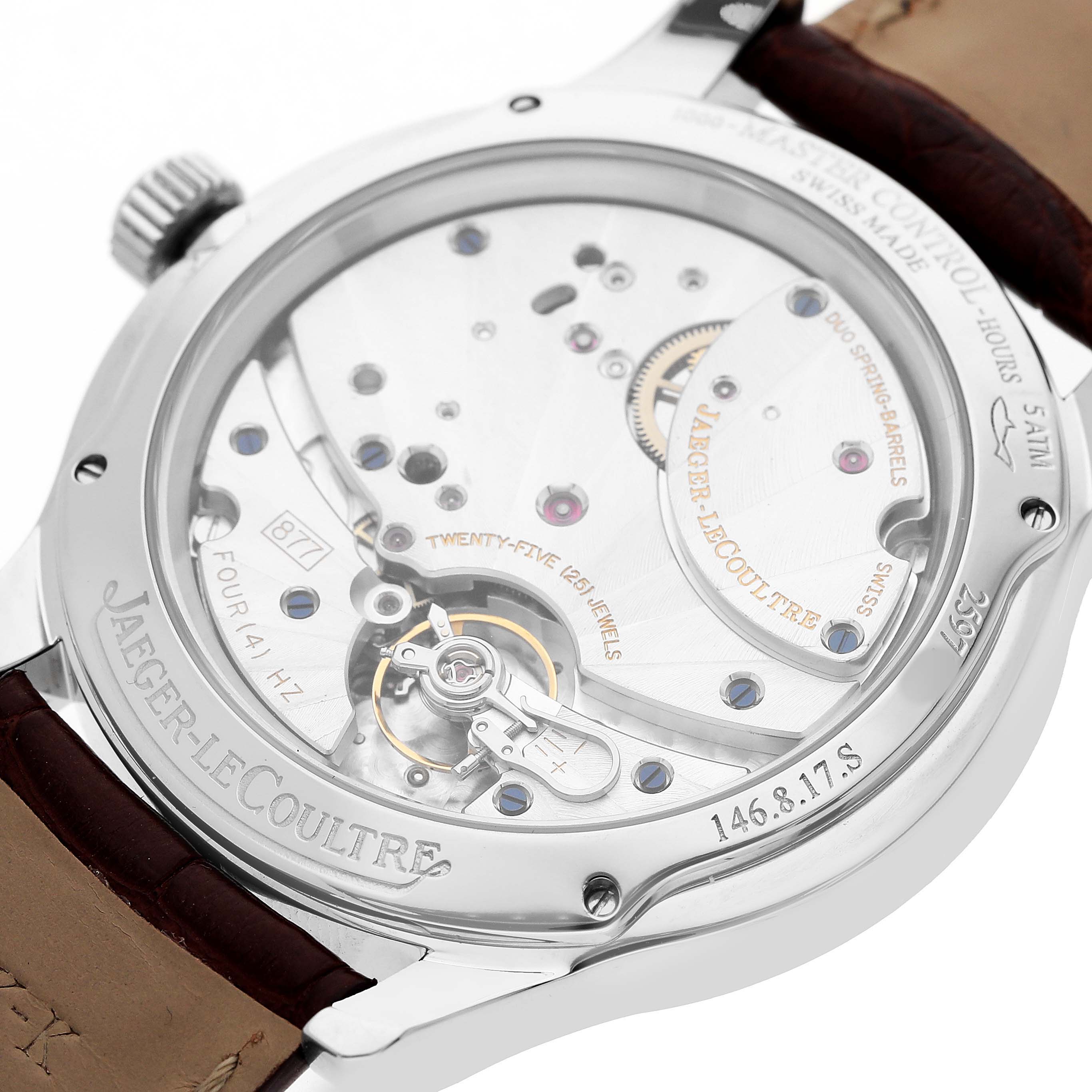 The image shows the back view of the Jaeger-LeCoultre Master watch, highlighting its movement and inner mechanics.