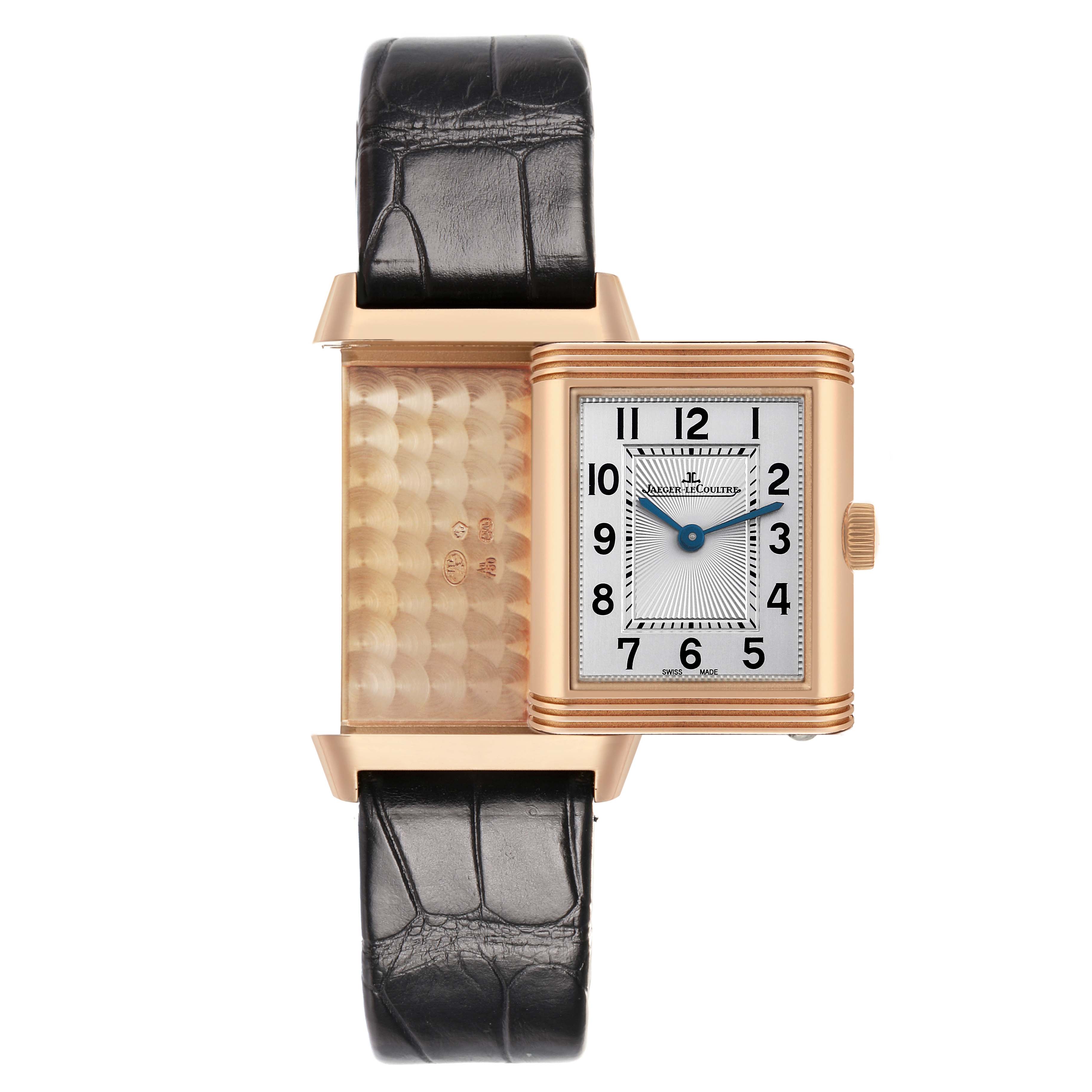 The Jaeger-LeCoultre Reverso watch is shown in a frontal view with its case swiveled to display the back and front simultaneously.