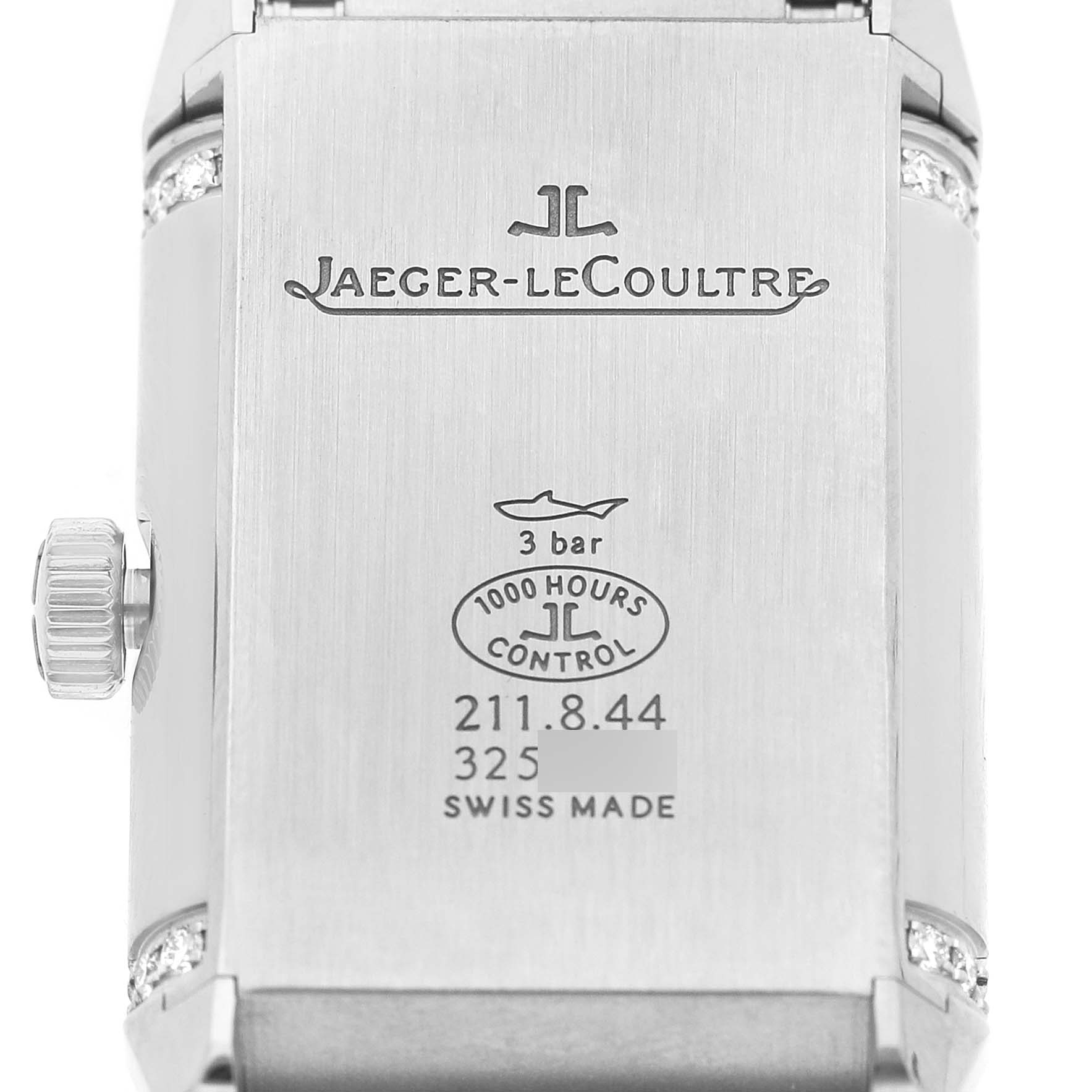 The image shows the back of the Jaeger-LeCoultre Reverso watch, highlighting the brand logo, inscriptions, and crown.