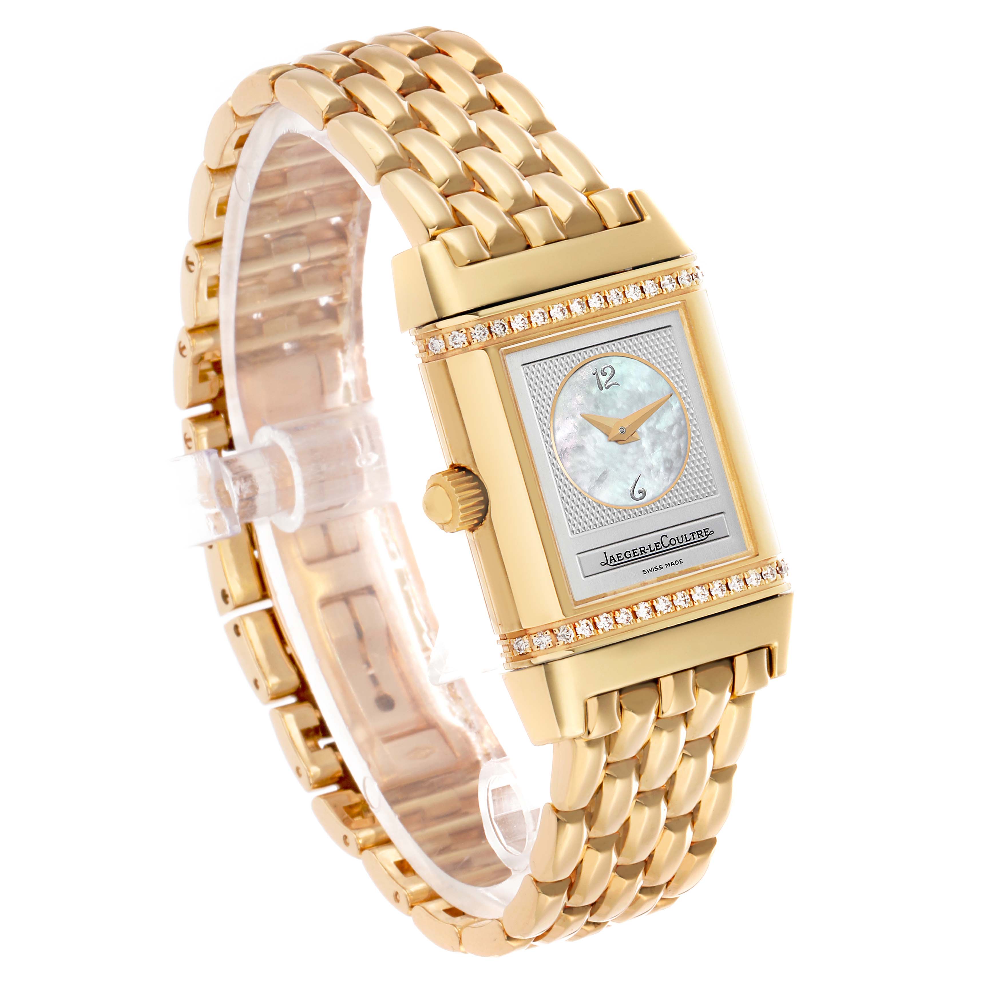 The Jaeger LeCoultre Reverso Q2661110 / 266.1.11 Women's Yellow Gold Silver Dial watch is shown at a three-quarter angle, highlighting its gold case, bracelet, and diamond-set bezel.