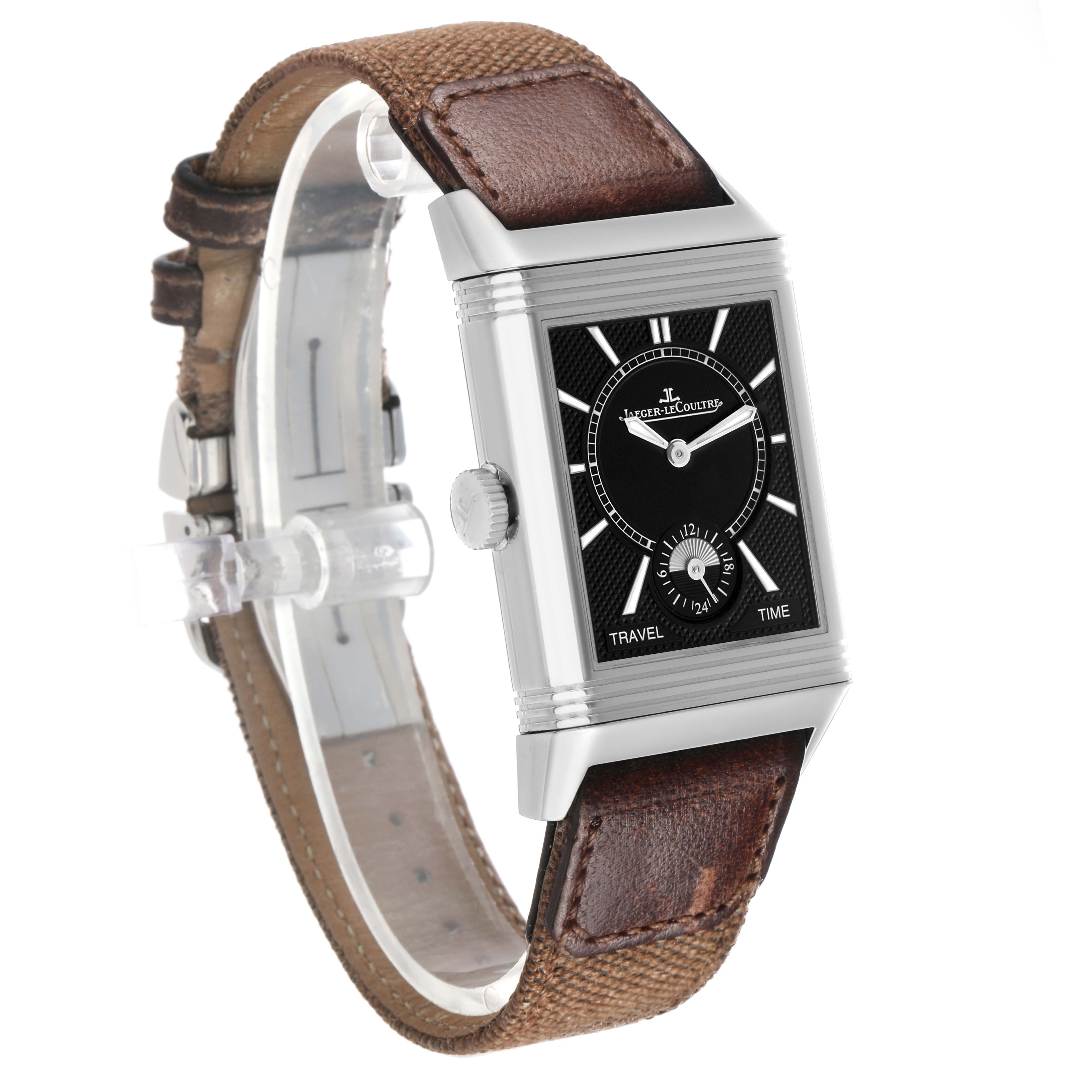 The Jaeger-LeCoultre Reverso watch is shown at an angle that displays the face, case, crown, and brown leather strap.
