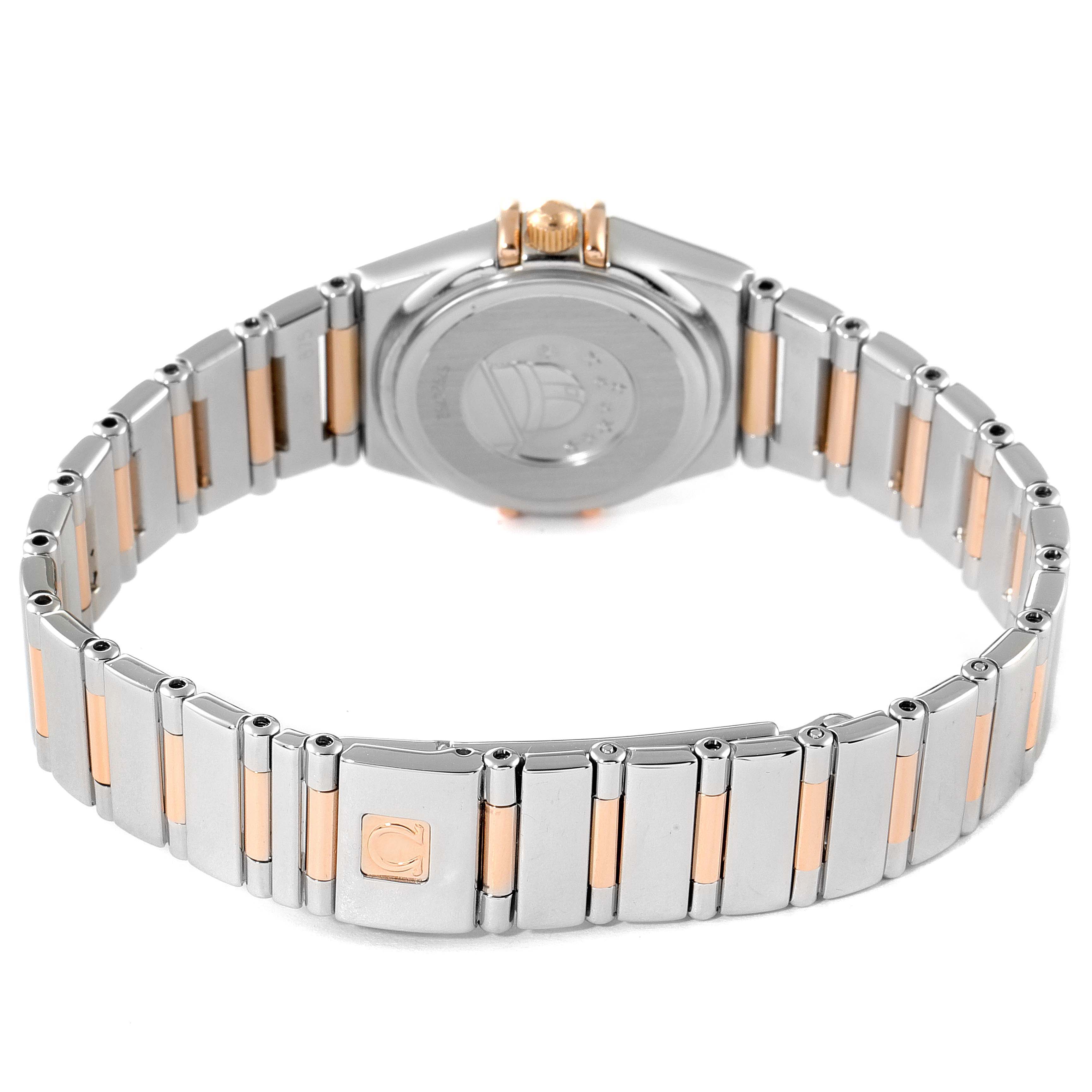 This Omega 1368.71.00 Women's Steel and Gold (two tone) Mother of Pearl Dial 1368.71.00 Women's Steel and Gold (two tone) Mother of Pearl Dial Constellation My Choice Steel Rose Gold Diamond Watch 1368.71.00 is shown from the back, highlighting the bracelet and case back.