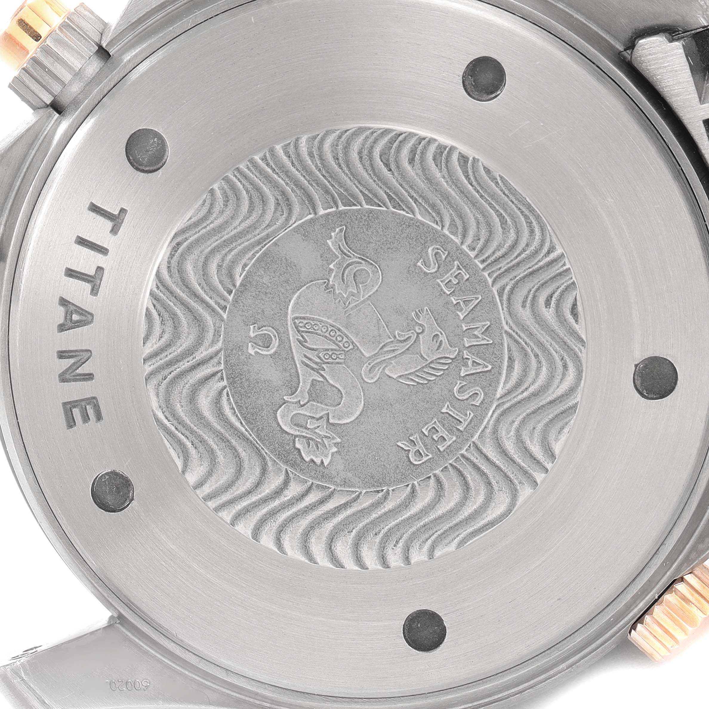 This image shows the engraved case back of an Omega Seamaster 2296.80.00 Men's Titanium Blue Dial 2296.80.00 Men's Titanium Blue Dial watch, highlighting the Seamaster logo and metal details.