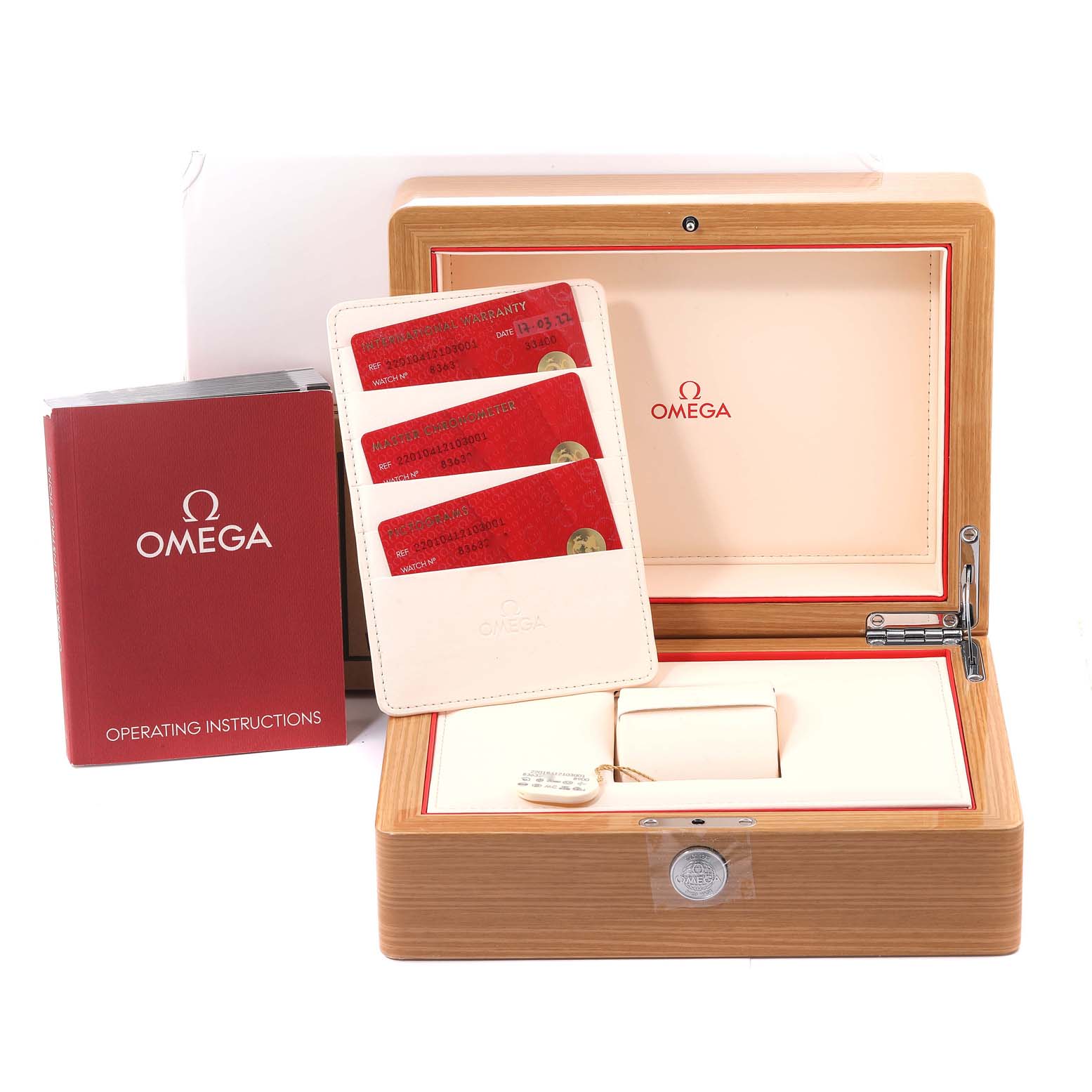 The image shows the Omega Aqua Terra 220.10.41.21.03.001 Men
s Stainless Steel Blue Dial 220.10.41.21.03.001 Men
s Stainless Steel Blue Dial watch
s box, warranty cards, and operating instructions from a front angle.