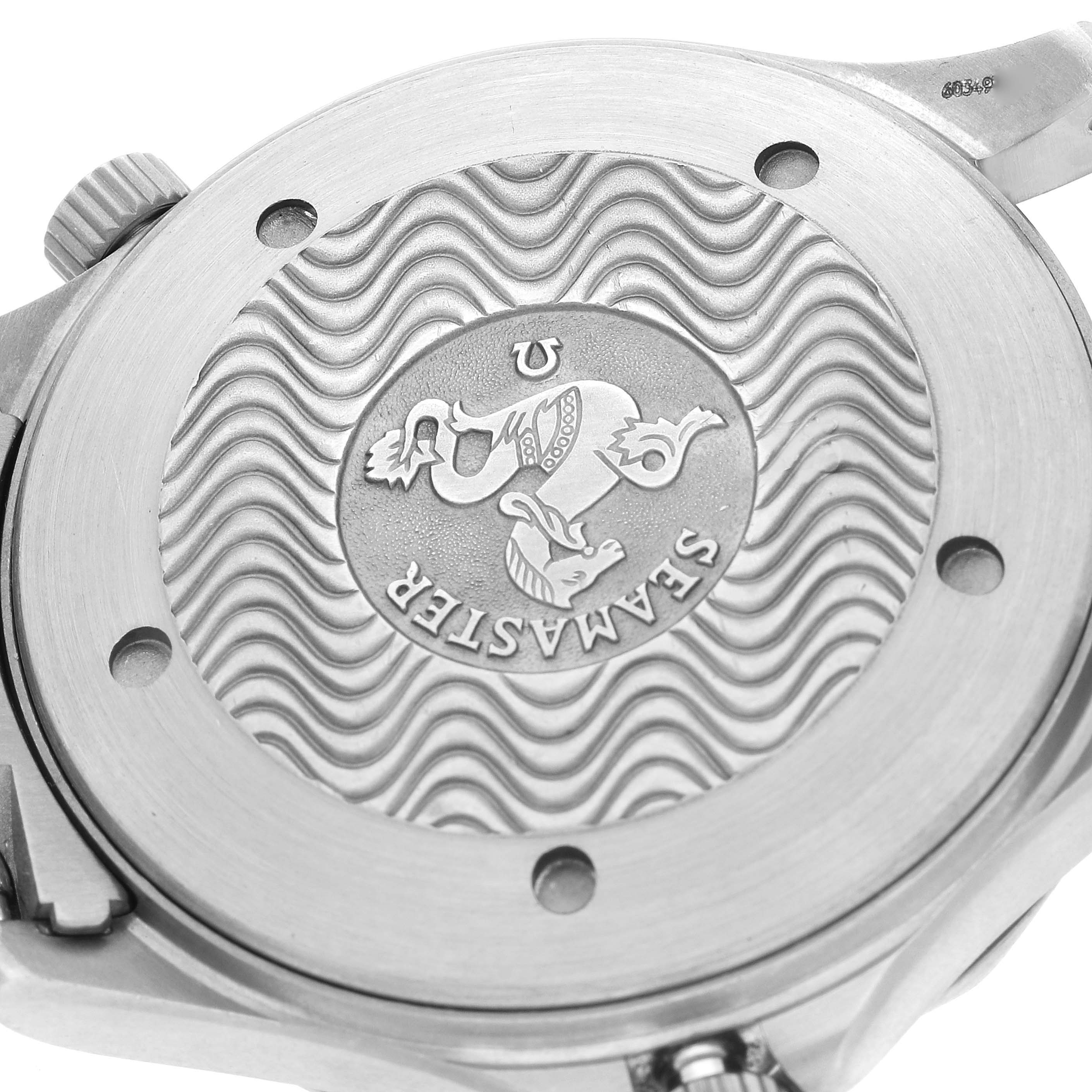 The image shows the case back of an Omega Seamaster 2231.80.00 Men's Stainless Steel Blue Dial 2231.80.00 Men's Stainless Steel Blue Dial watch, highlighting the wave pattern and the Seamaster emblem.