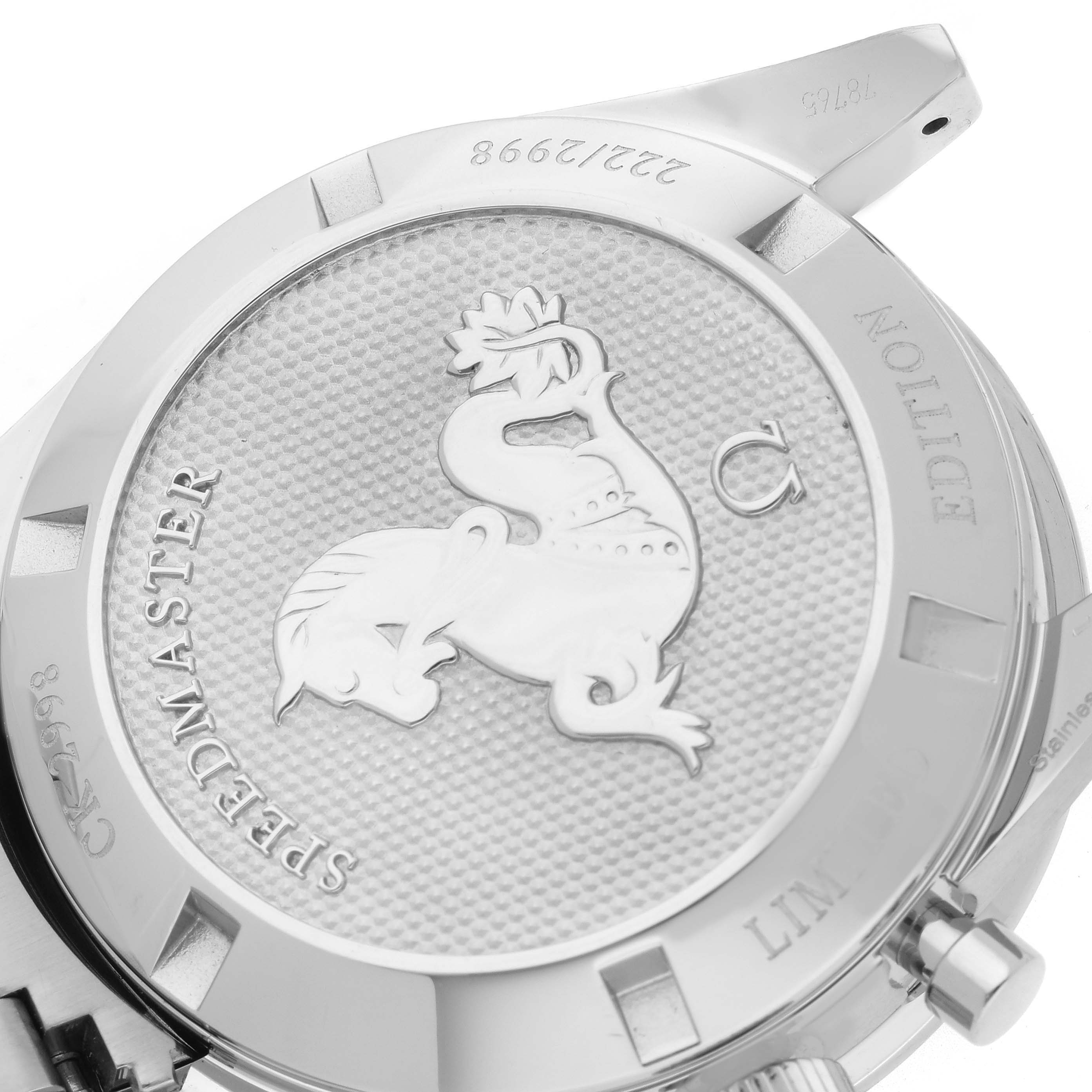 The image shows the back of an Omega Speedmaster 311.32.40.30.02.001 Men's Stainless Steel Silver Dial 311.32.40.30.02.001 Men's Stainless Steel Silver Dial watch, highlighting the embossed emblem and engraving details.