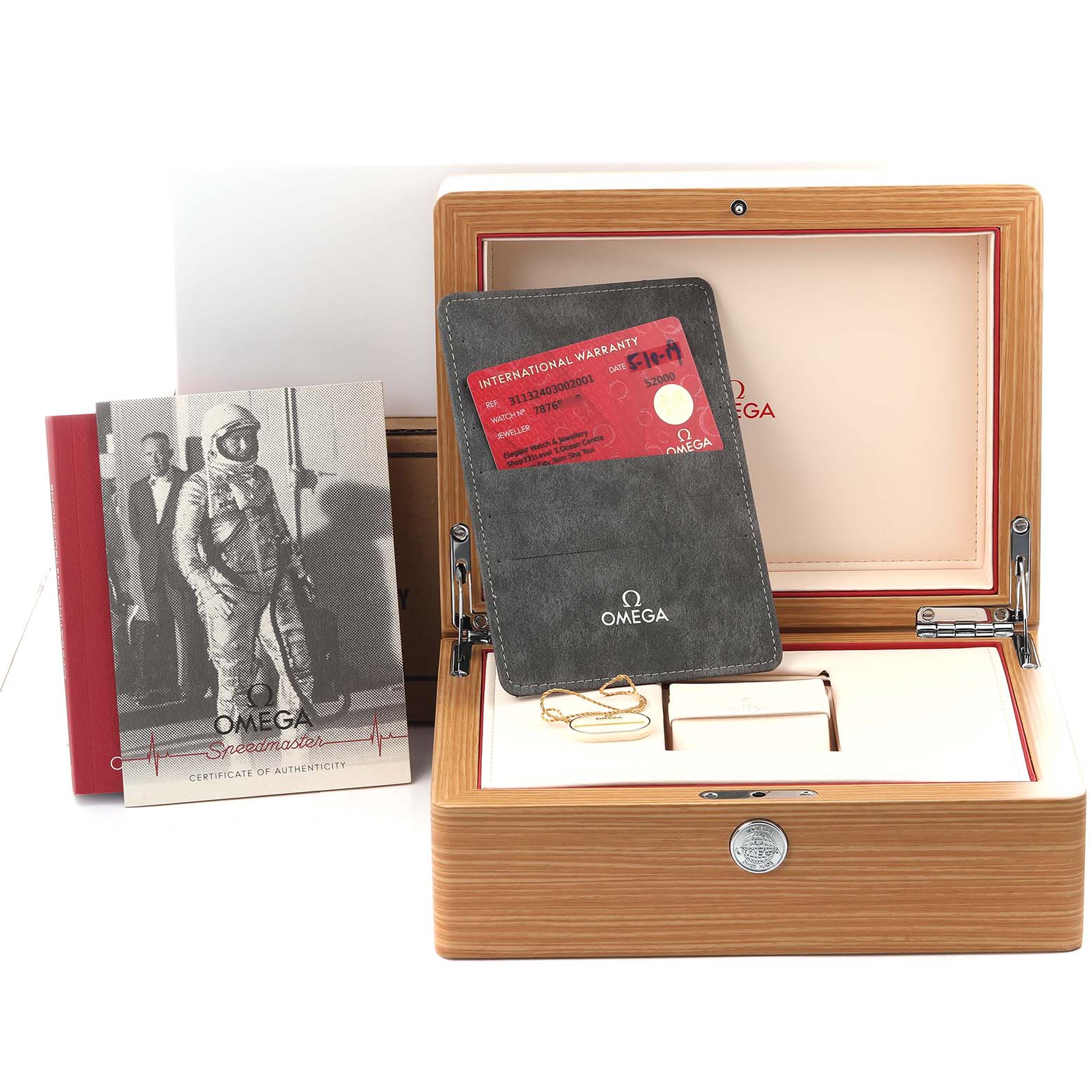 The image shows the Omega Speedmaster 311.32.40.30.02.001 Men's Stainless Steel Silver Dial 311.32.40.30.02.001 Men's Stainless Steel Silver Dial's box, warranty card holder, certificate, and a booklet, all from a frontal angle.