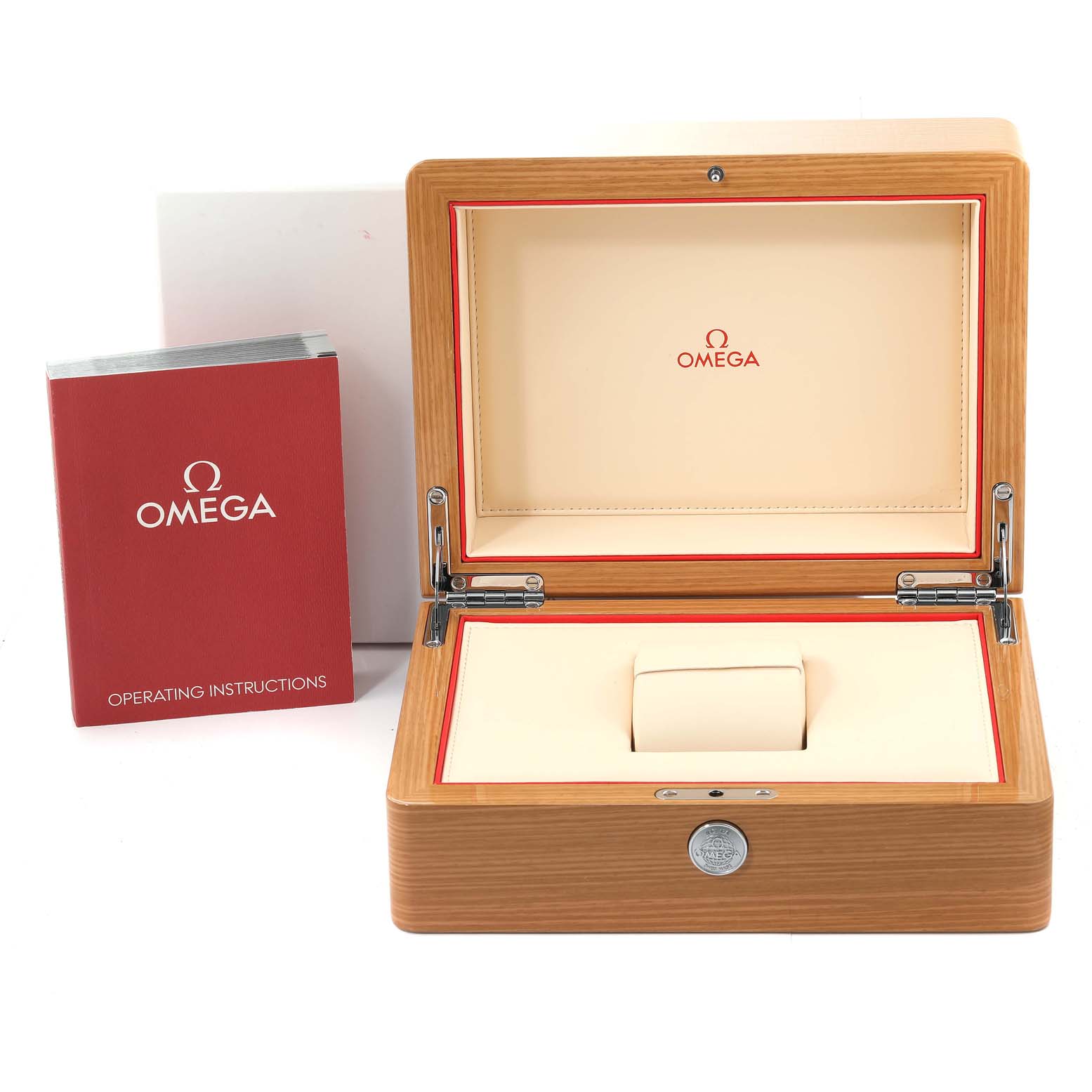 The image displays the opened wooden case and operating instructions for an Omega Speedmaster 311.93.44.51.99.001 Men's Ceramic Silver Dial 311.93.44.51.99.001 Men's Ceramic Silver Dial watch.