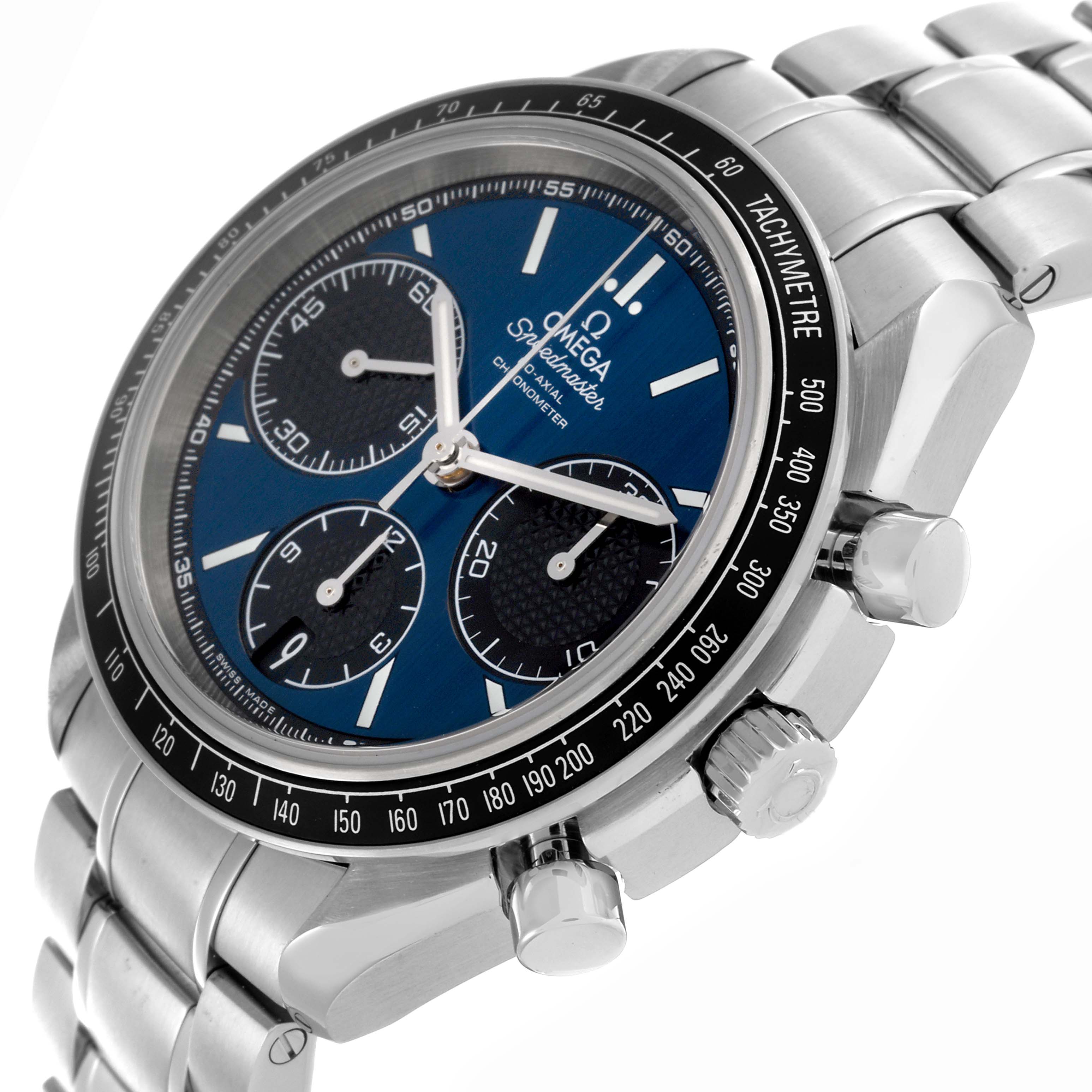 The Omega Speedmaster 326.30.40.50.03.001 Men
s Stainless Steel Blue Dial 326.30.40.50.03.001 Men
s Stainless Steel Blue Dial watch is shown at an angle highlighting the face, bezel, and side buttons.