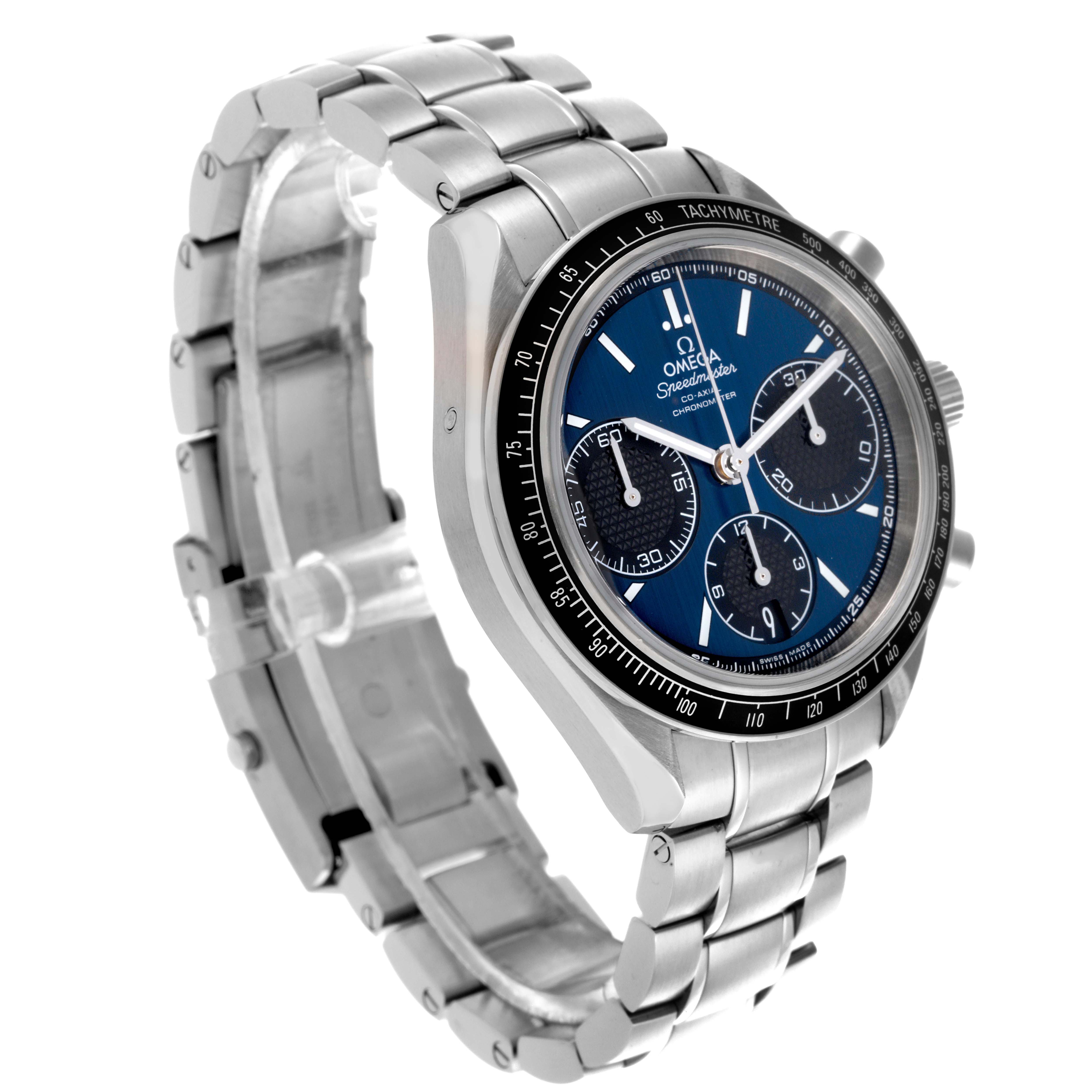The Omega Speedmaster 326.30.40.50.03.001 Men
s Stainless Steel Blue Dial 326.30.40.50.03.001 Men
s Stainless Steel Blue Dial watch is shown at an angle highlighting the bracelet, bezel, and dial.