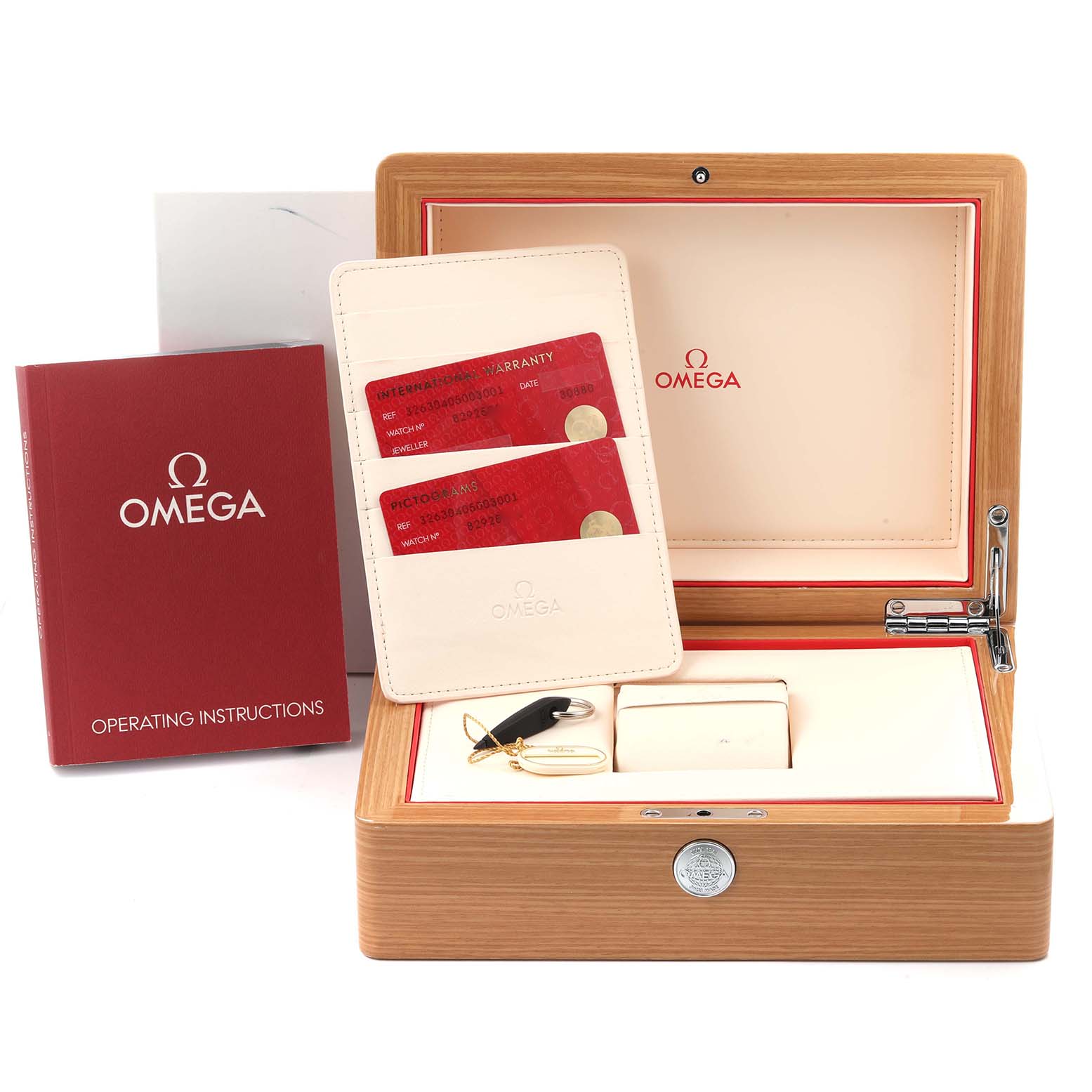 The image shows an Omega Speedmaster 326.30.40.50.03.001 Men
s Stainless Steel Blue Dial 326.30.40.50.03.001 Men
s Stainless Steel Blue Dial box set with a wooden case, warranty cards, and an instruction booklet.