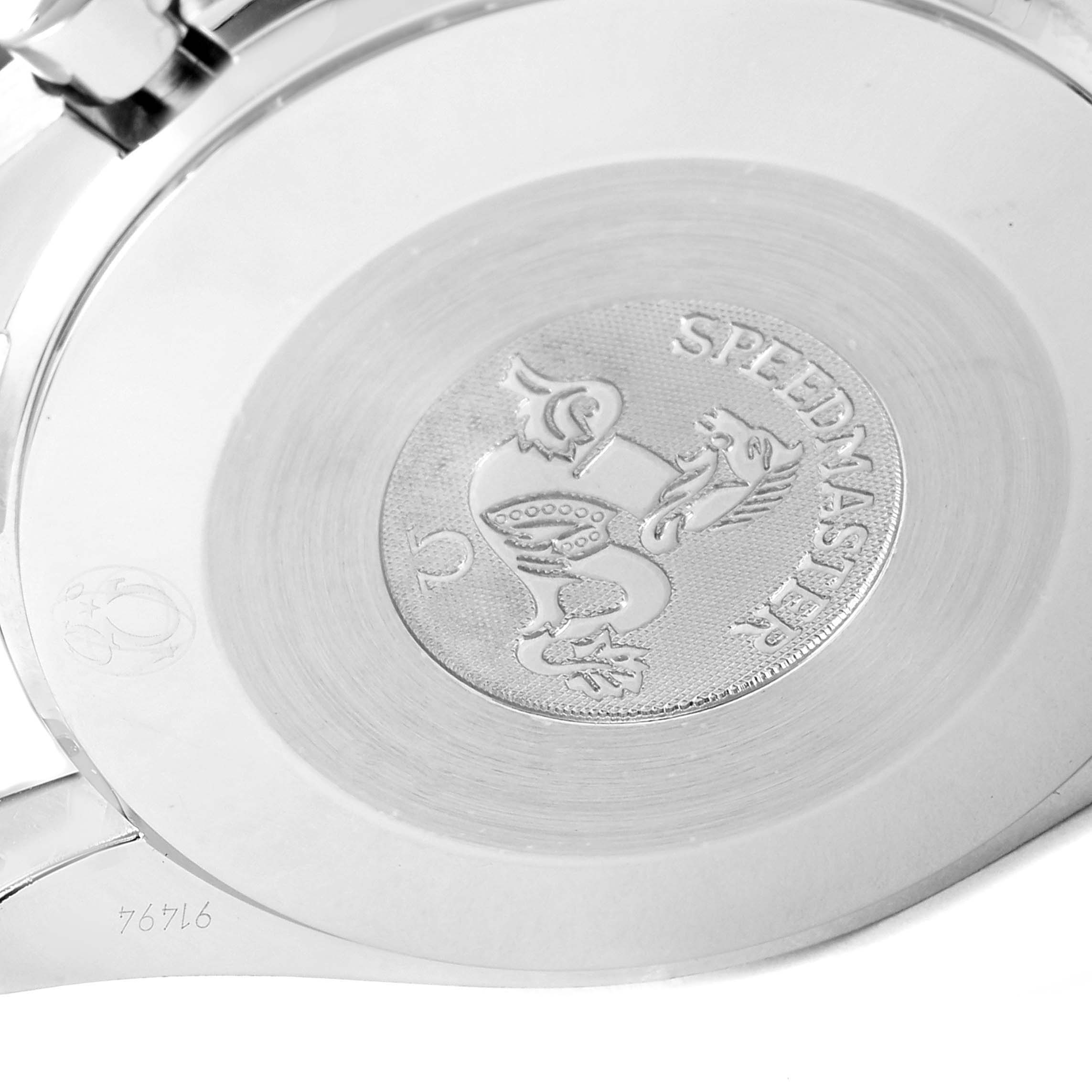 This image shows the engraved case back of an Omega Speedmaster 3539.50.00 Men's Stainless Steel Black Dial 3539.50.00 Men's Stainless Steel Black Dial watch, viewed from a straight angle.