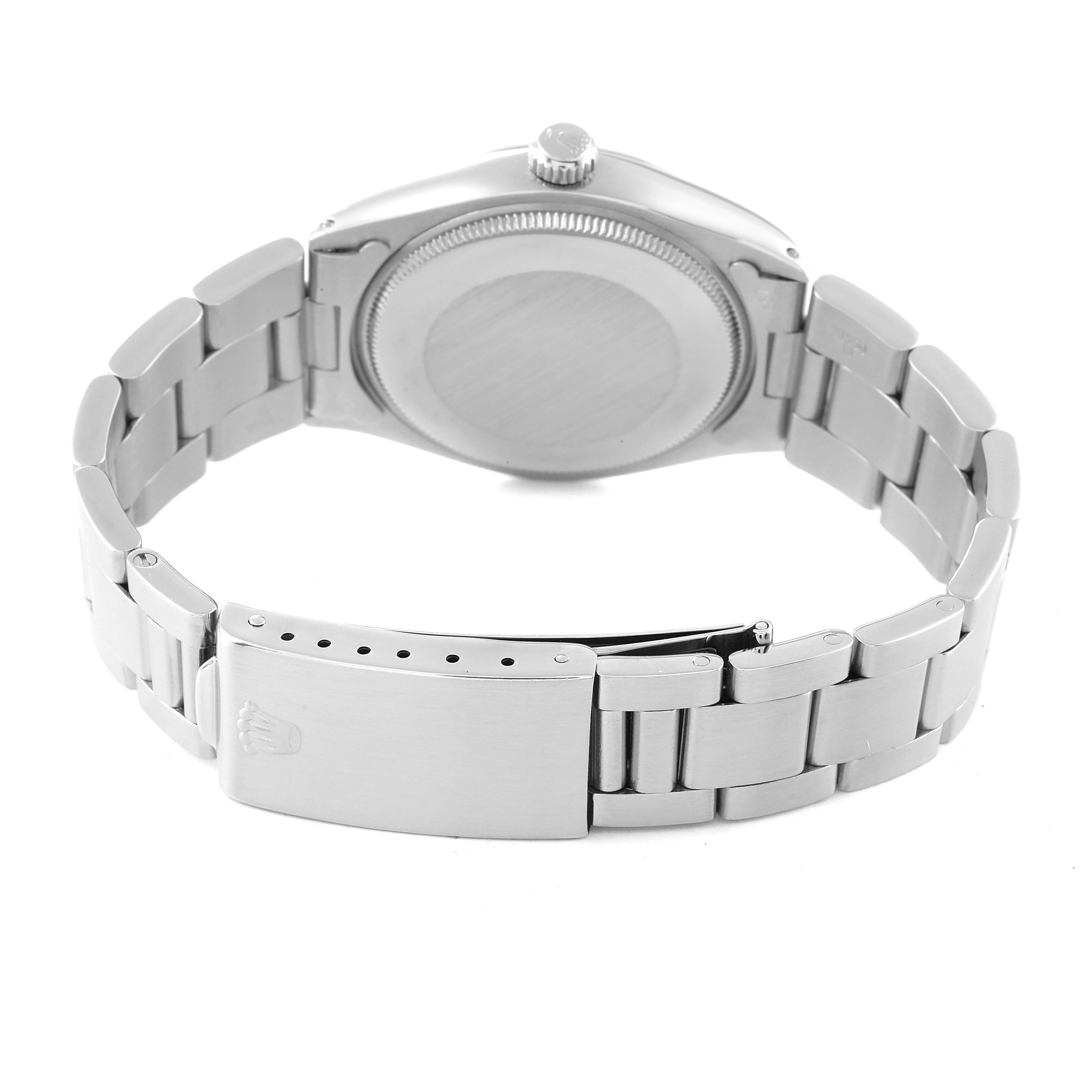 This image shows the back and bracelet clasp of a Rolex Air-King 5500 Men's Stainless Steel Silver Dial 5500 Men's Stainless Steel Silver Dial watch, including the case back and part of the metal bracelet.