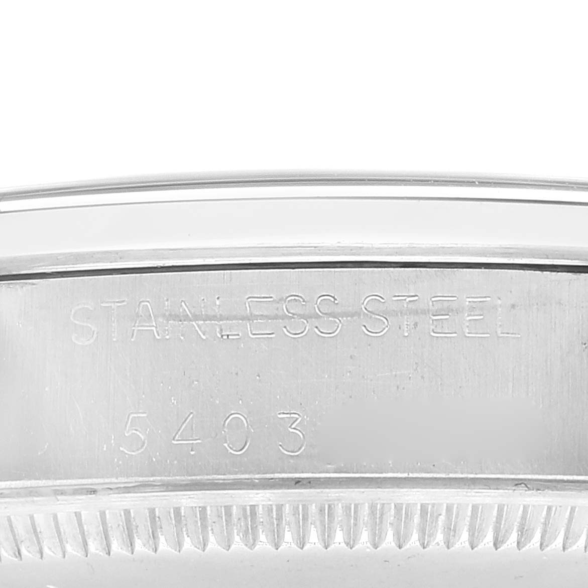 Close-up of the side of a Rolex Air-King 5500 Men's Stainless Steel Silver Dial 5500 Men's Stainless Steel Silver Dial watch showing the stainless steel engraving and serial number.