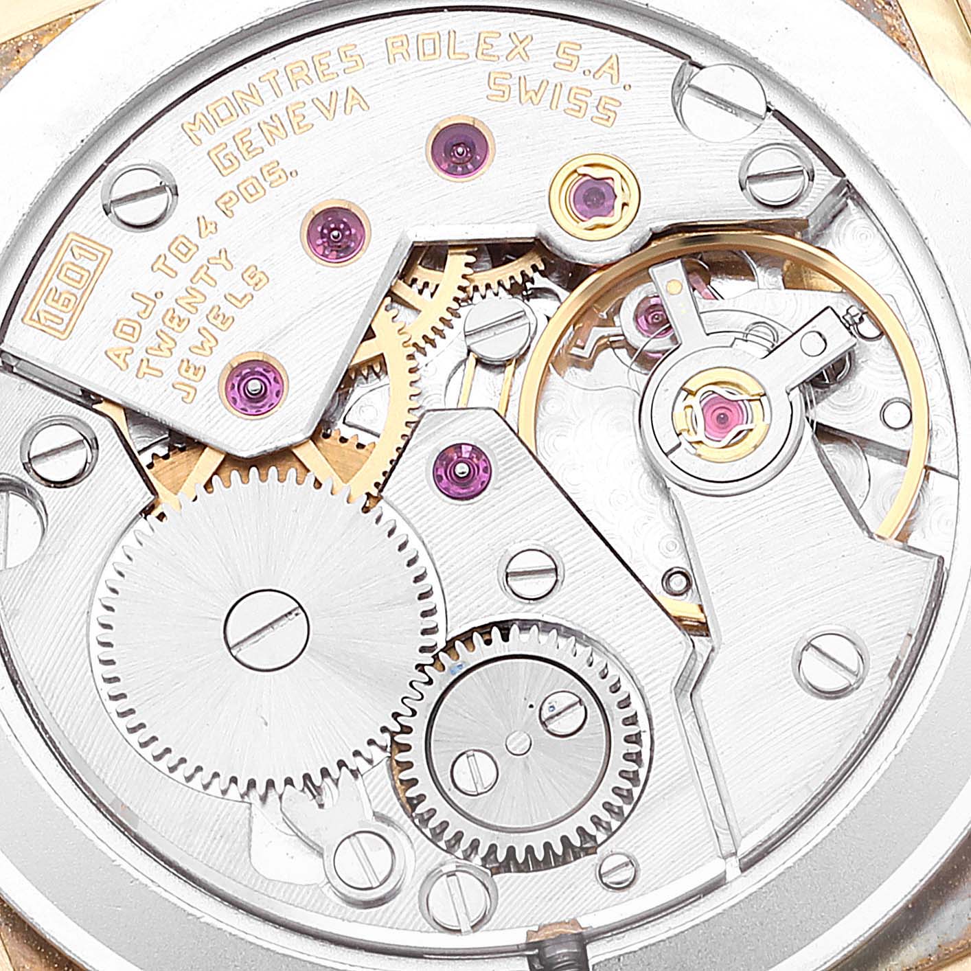 This image shows a close-up of the internal movement and gears of the Rolex Cellini 4084 Men's Yellow Gold Champagne Dial 4084 Men's Yellow Gold Champagne Dial watch.