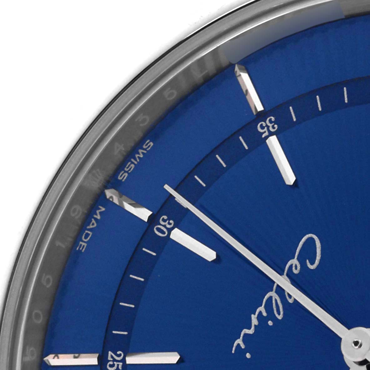 The image shows the upper left quadrant of the Rolex Cellini 50519 Men's White Gold Blue Dial 50519 Men's White Gold Blue Dial watch's blue dial, featuring minute markers and the "Cellini" signature.