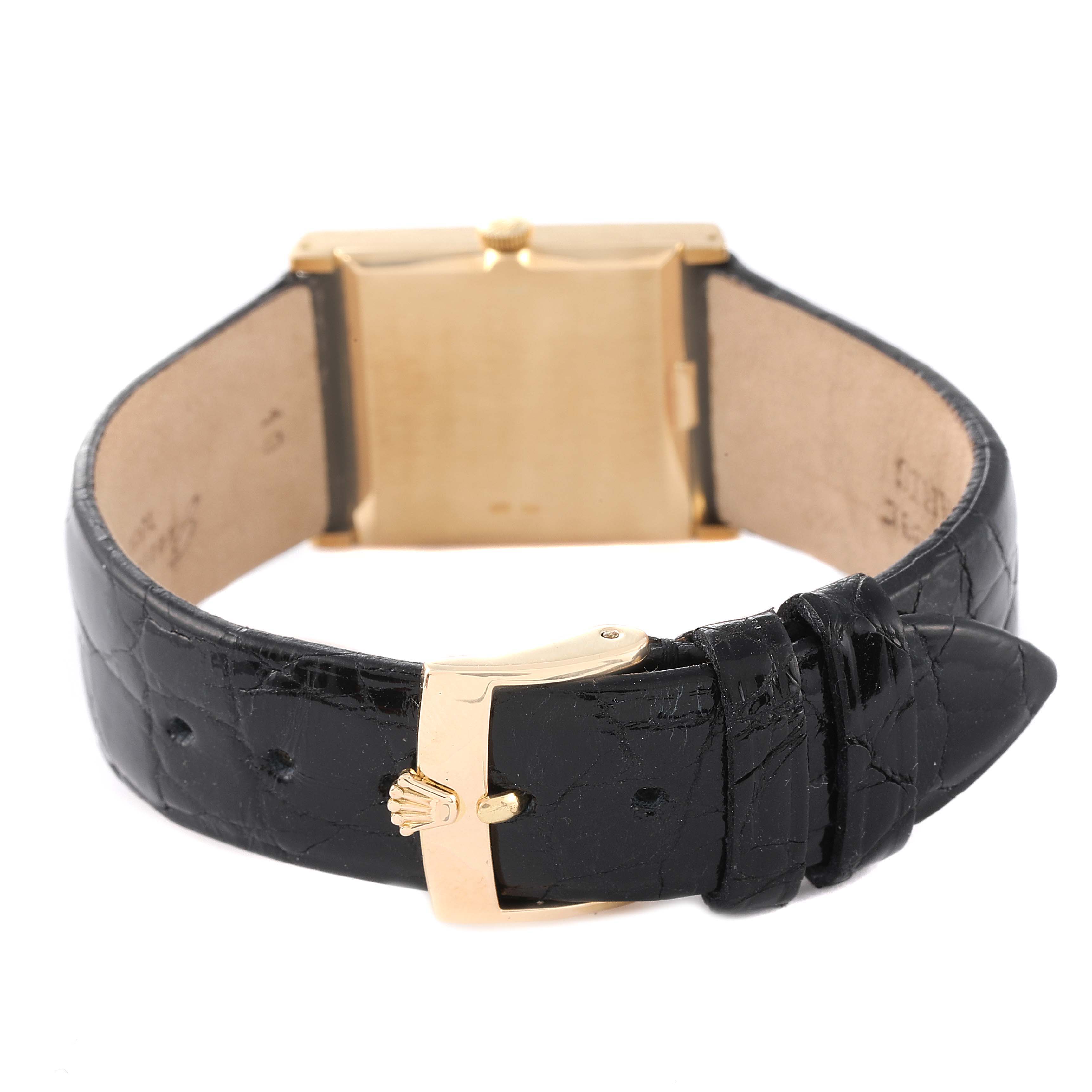 This image shows the back of the Rolex Cellini 4014 Men's Yellow Gold Champagne Dial 4014 Men's Yellow Gold Champagne Dial watch, featuring the black leather strap and gold buckle.