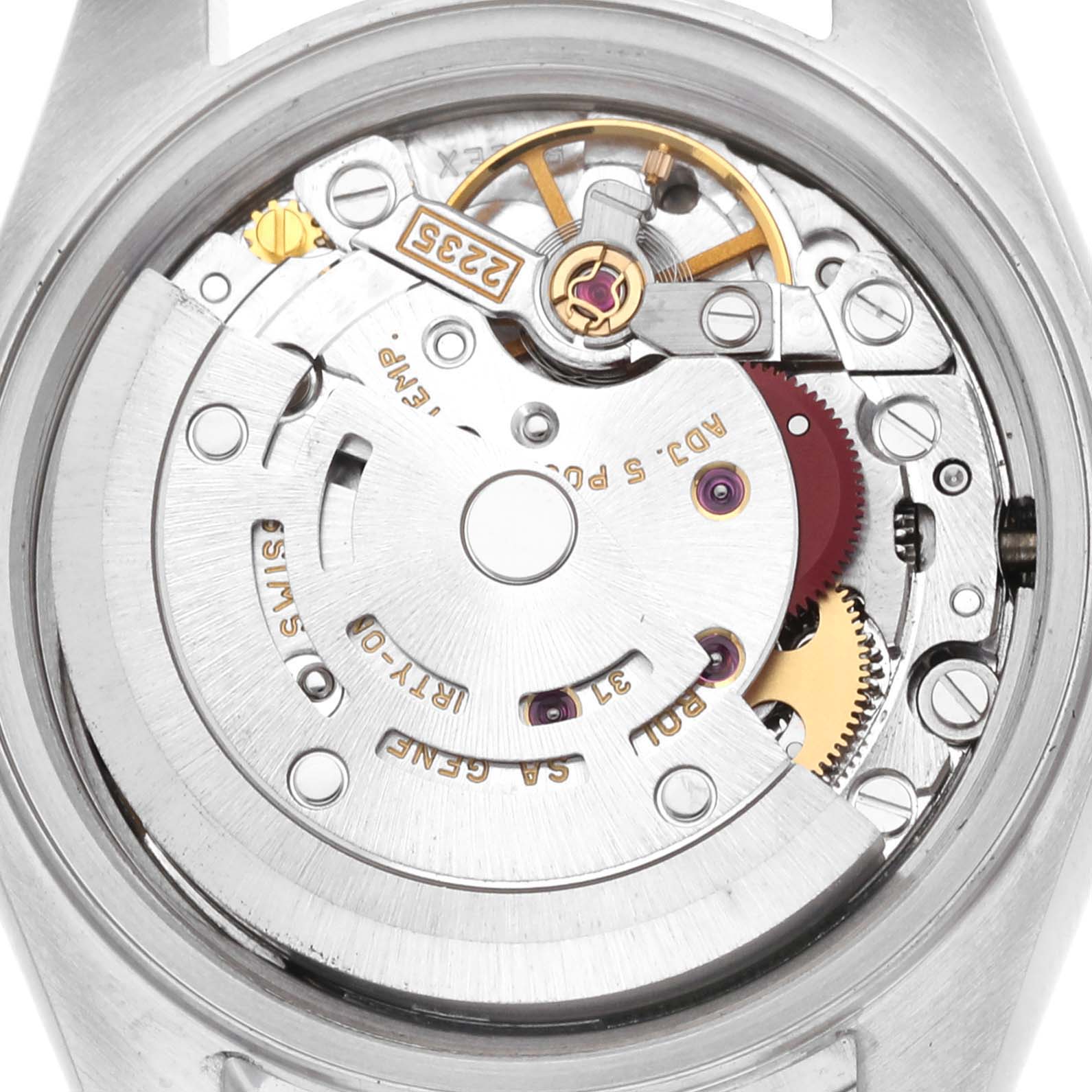 The image shows a close-up view of the movement inside a Rolex Date 79160 Women
s Stainless Steel Blue Dial 79160 Women
s Stainless Steel Blue Dial model, highlighting the intricate gears and mechanisms.