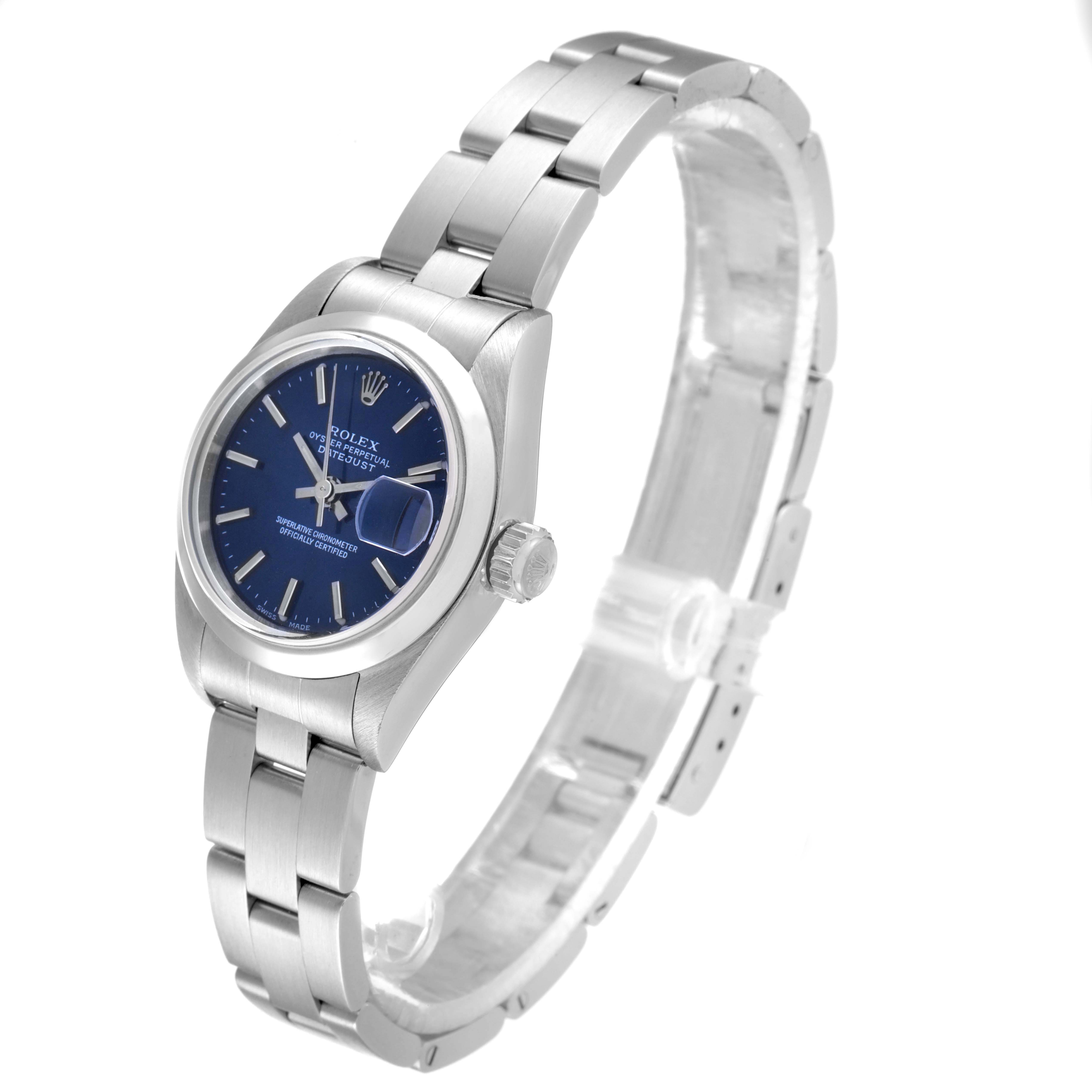 The image shows a Rolex Date 69160 Women's Stainless Steel Blue Dial 69160 Women's Stainless Steel Blue Dial model watch angled to display its blue dial, crown, and metal bracelet.
