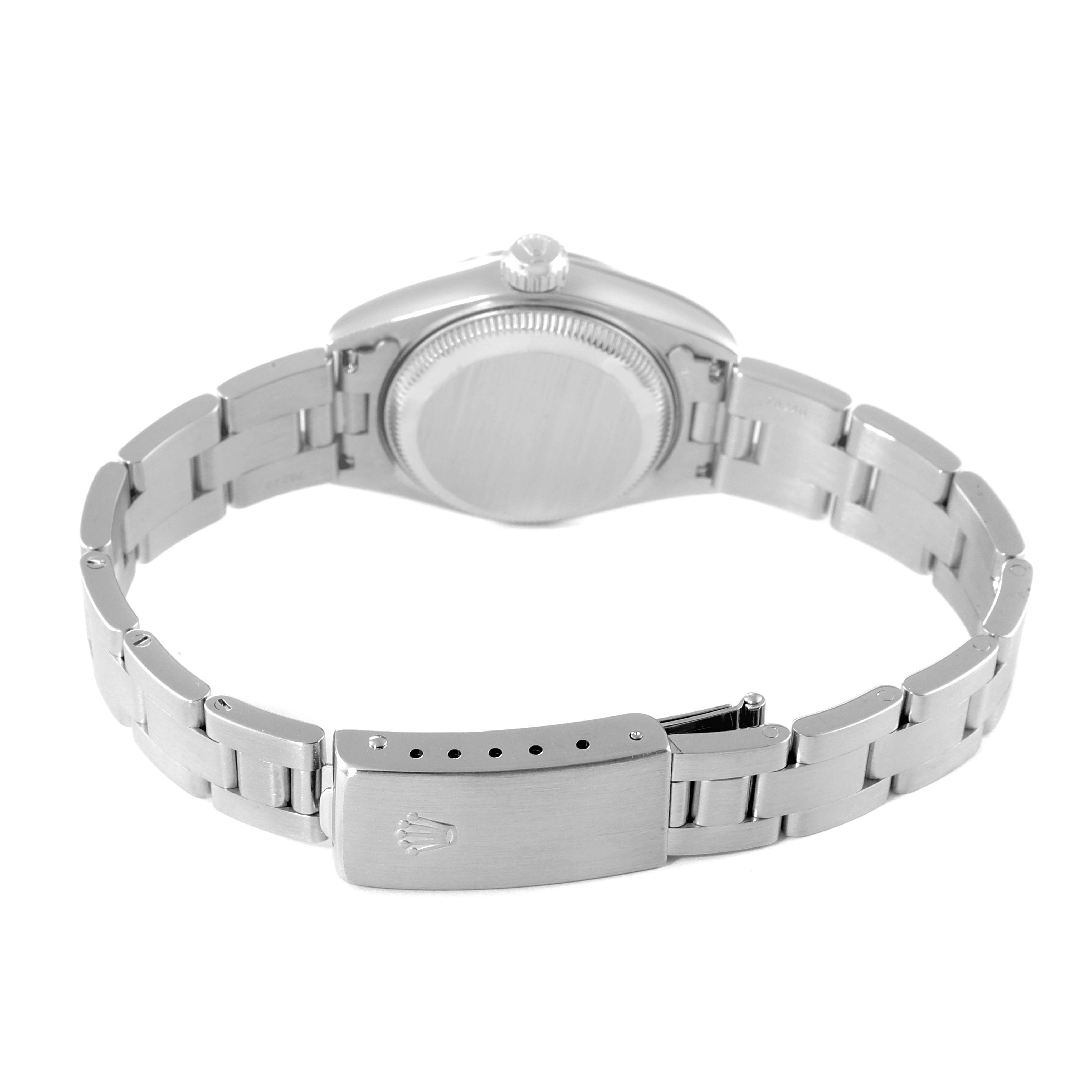 This image shows the back and bracelet of a Rolex Date 69160 Women's Stainless Steel Blue Dial 69160 Women's Stainless Steel Blue Dial model watch from a top-down angle.