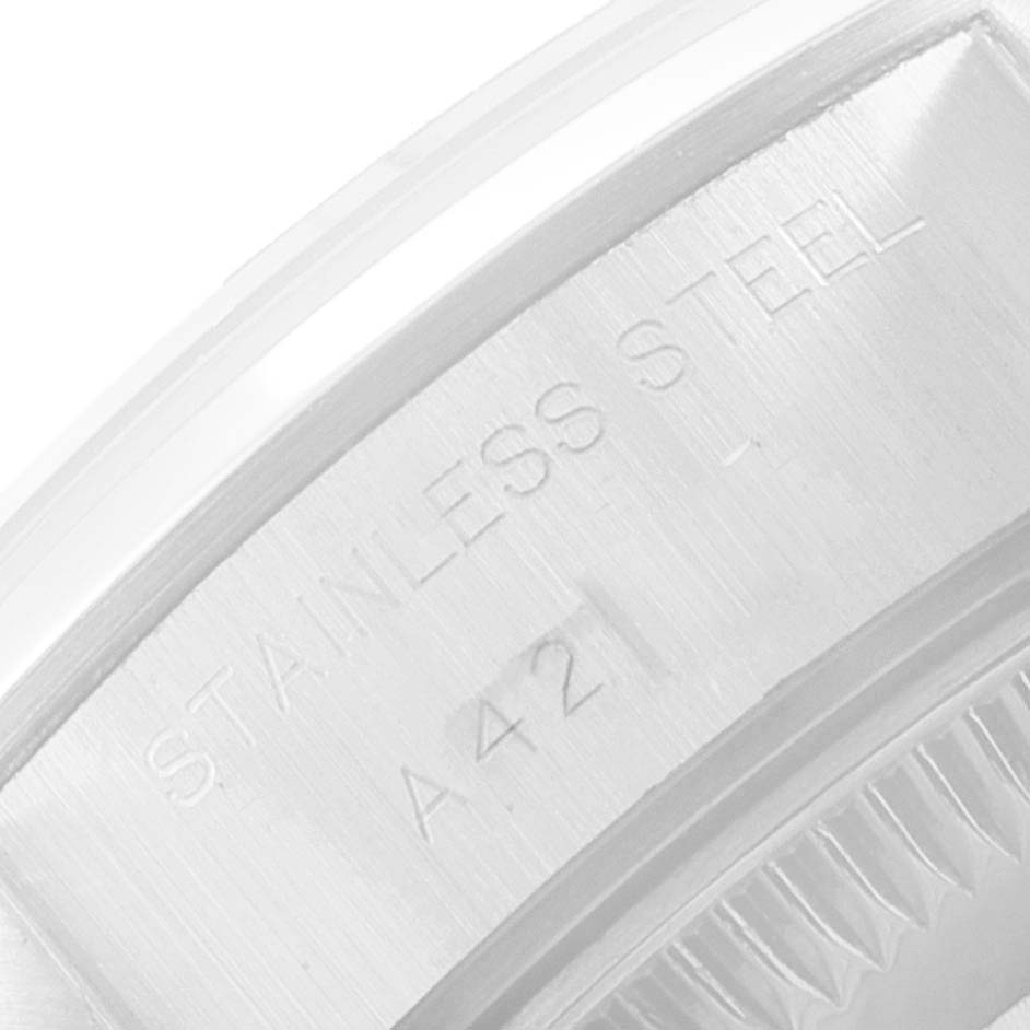 Close-up of the engraving on the stainless steel case back of a Rolex Date 69160 Women's Stainless Steel Blue Dial 69160 Women's Stainless Steel Blue Dial model watch.