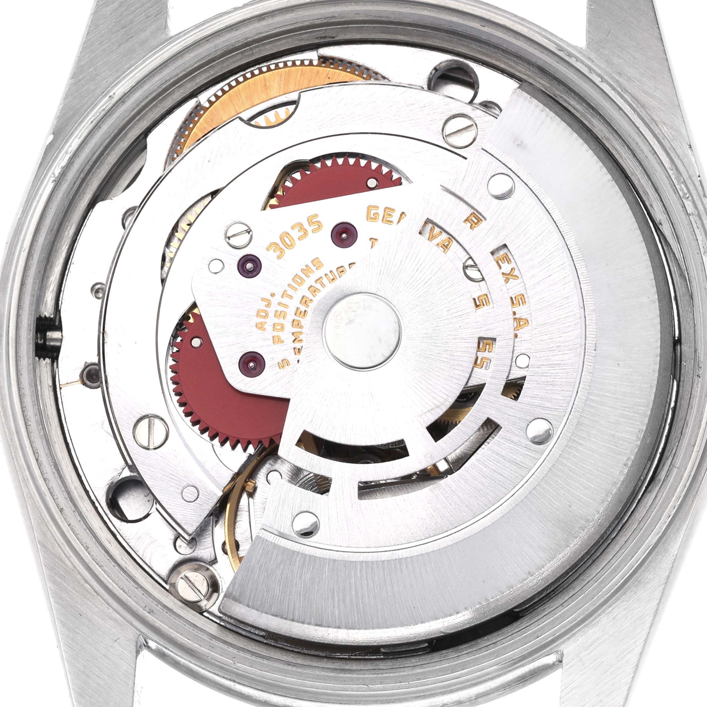 The image shows the movement of a Rolex Date 15000 Men's Stainless Steel Silver Dial 15000 Men's Stainless Steel Silver Dial model watch from a back view, highlighting its intricate mechanics.