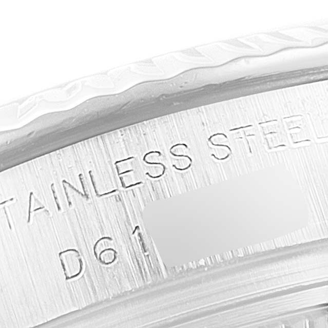 The image shows a close-up of the stainless steel engraved part of a Rolex Datejust 179174 Women's Stainless Steel Mother of Pearl Dial 179174 Women's Stainless Steel Mother of Pearl Dial watch case.
