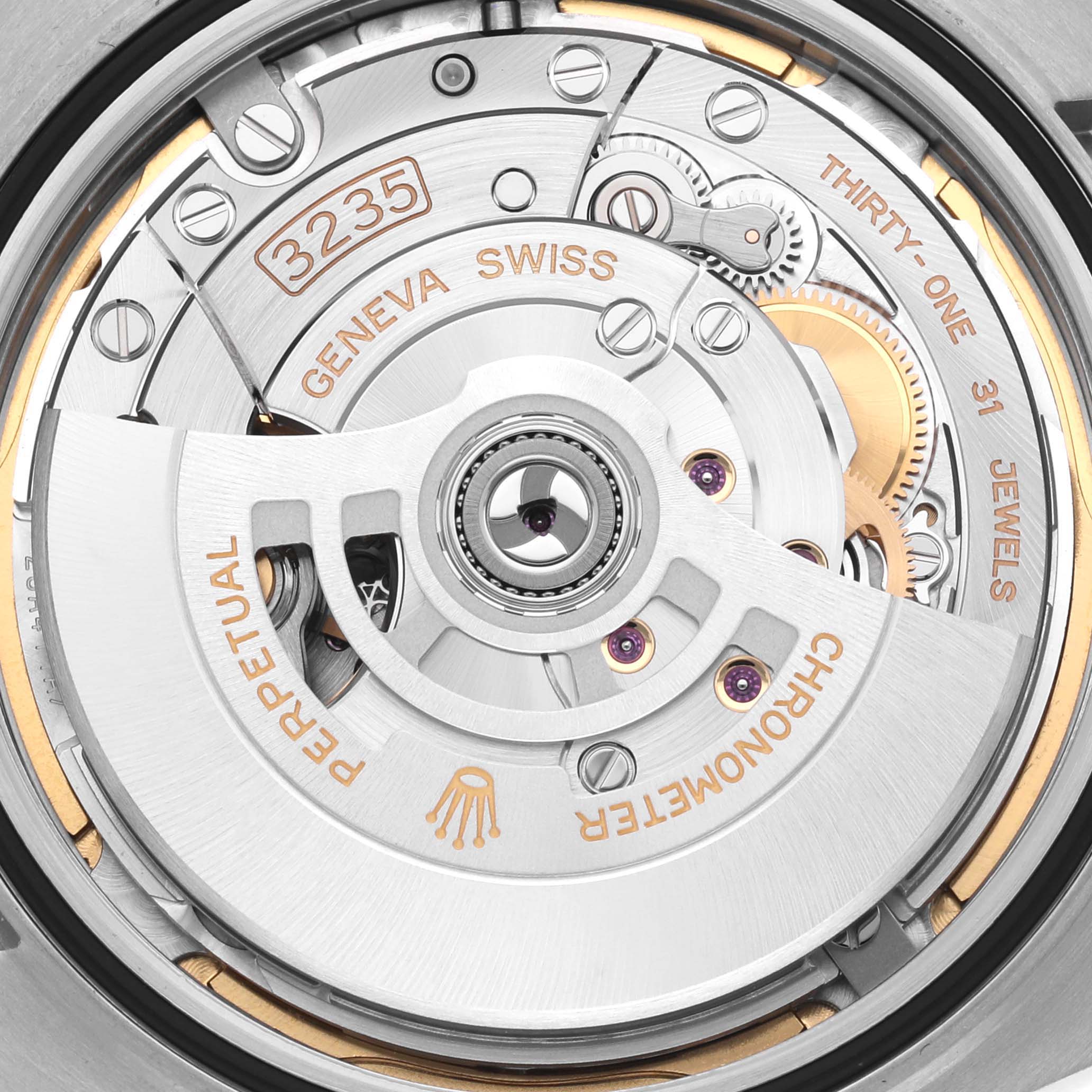 The image shows the movement of the Rolex Datejust 41 126300 Men's Stainless Steel Grey Dial 126300 Men's Stainless Steel Grey Dial, displaying its intricate mechanical parts from a top-down angle.