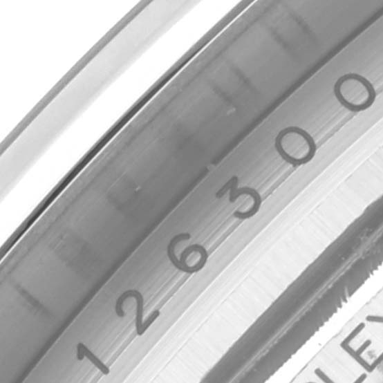 The image shows a close-up of the bezel and inner ring of a Rolex Datejust 41 126300 Men's Stainless Steel Grey Dial 126300 Men's Stainless Steel Grey Dial watch, highlighting the numerals.