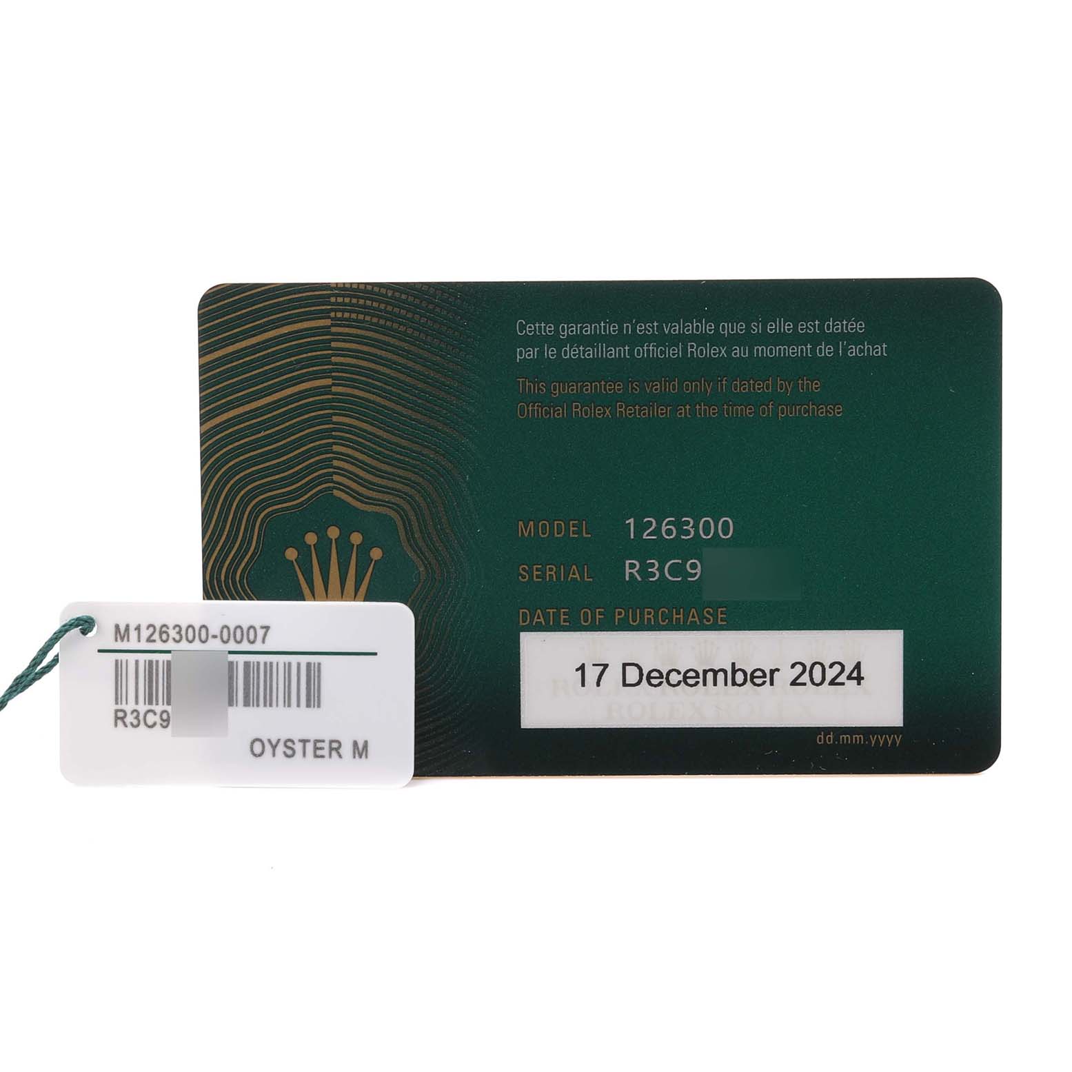 The image shows a Rolex Datejust 41 126300 Men's Stainless Steel Grey Dial 126300 Men's Stainless Steel Grey Dial warranty card and a tag with model and serial details.