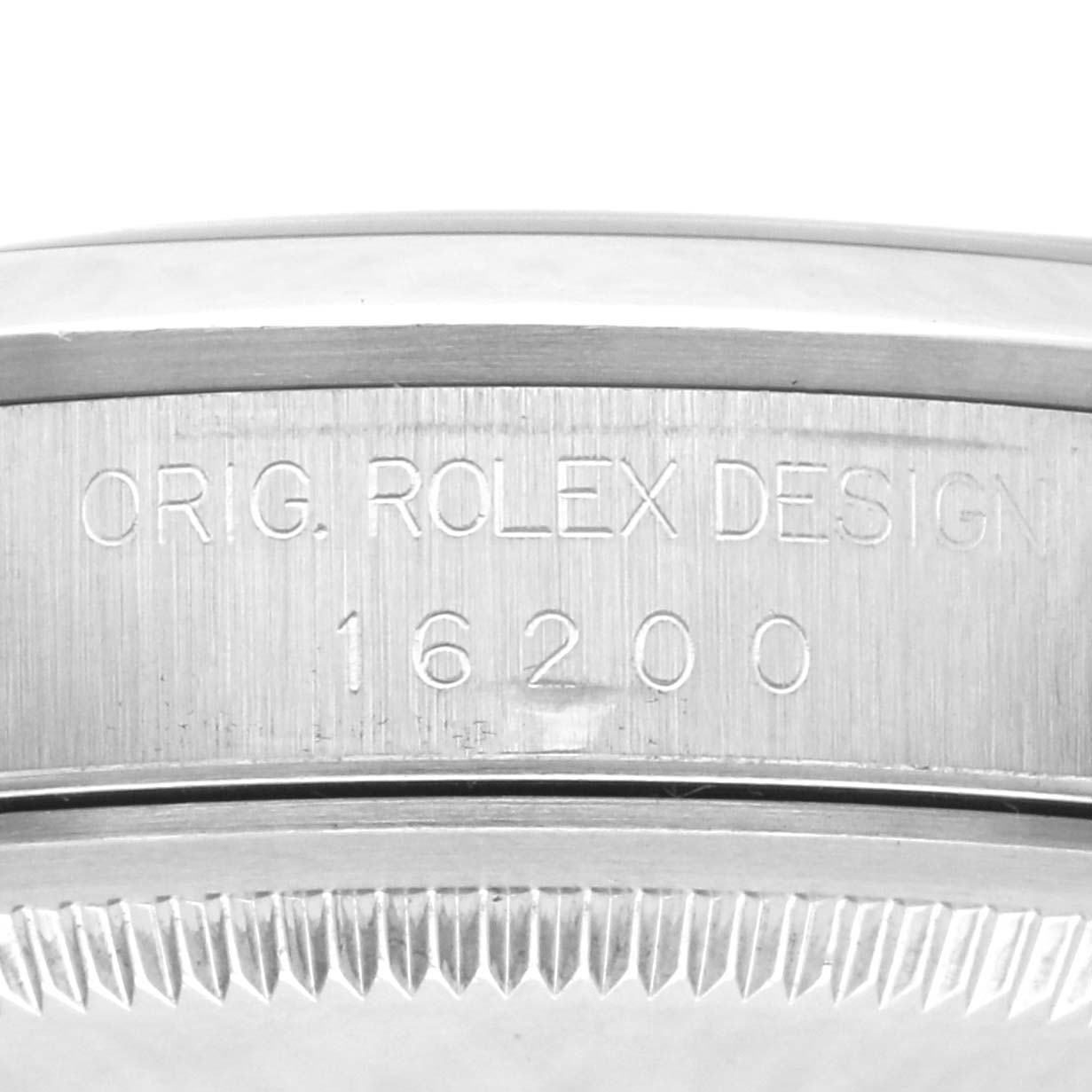 The image shows a close-up of the engraving on the side of the Rolex Datejust 16200 Men's Stainless Steel Blue Dial 16200 Men's Stainless Steel Blue Dial case, displaying the model number.