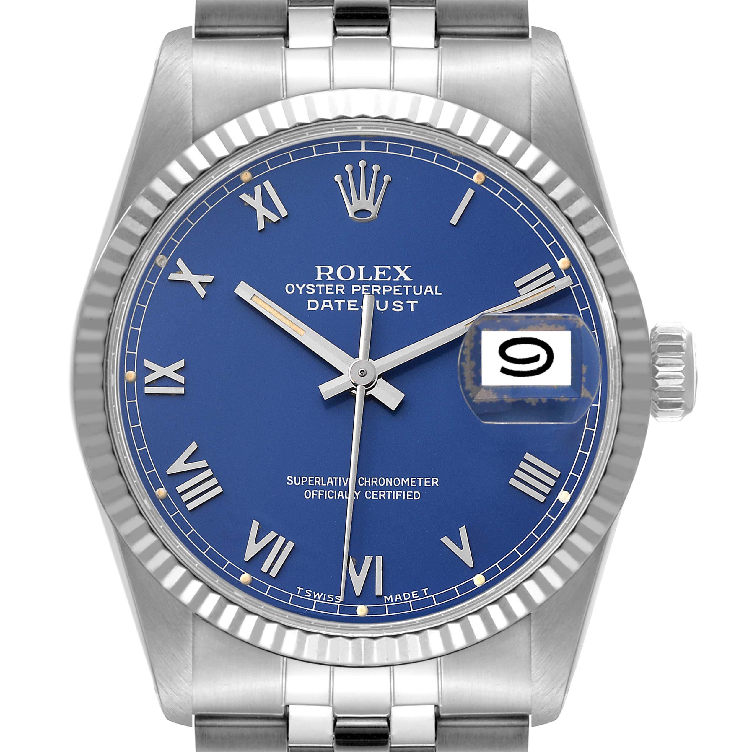 The image shows a frontal view of the Rolex Datejust 16014 Men's Stainless Steel Blue Dial 16014 Men's Stainless Steel Blue Dial watch displaying the blue dial, date window, and part of the bracelet.