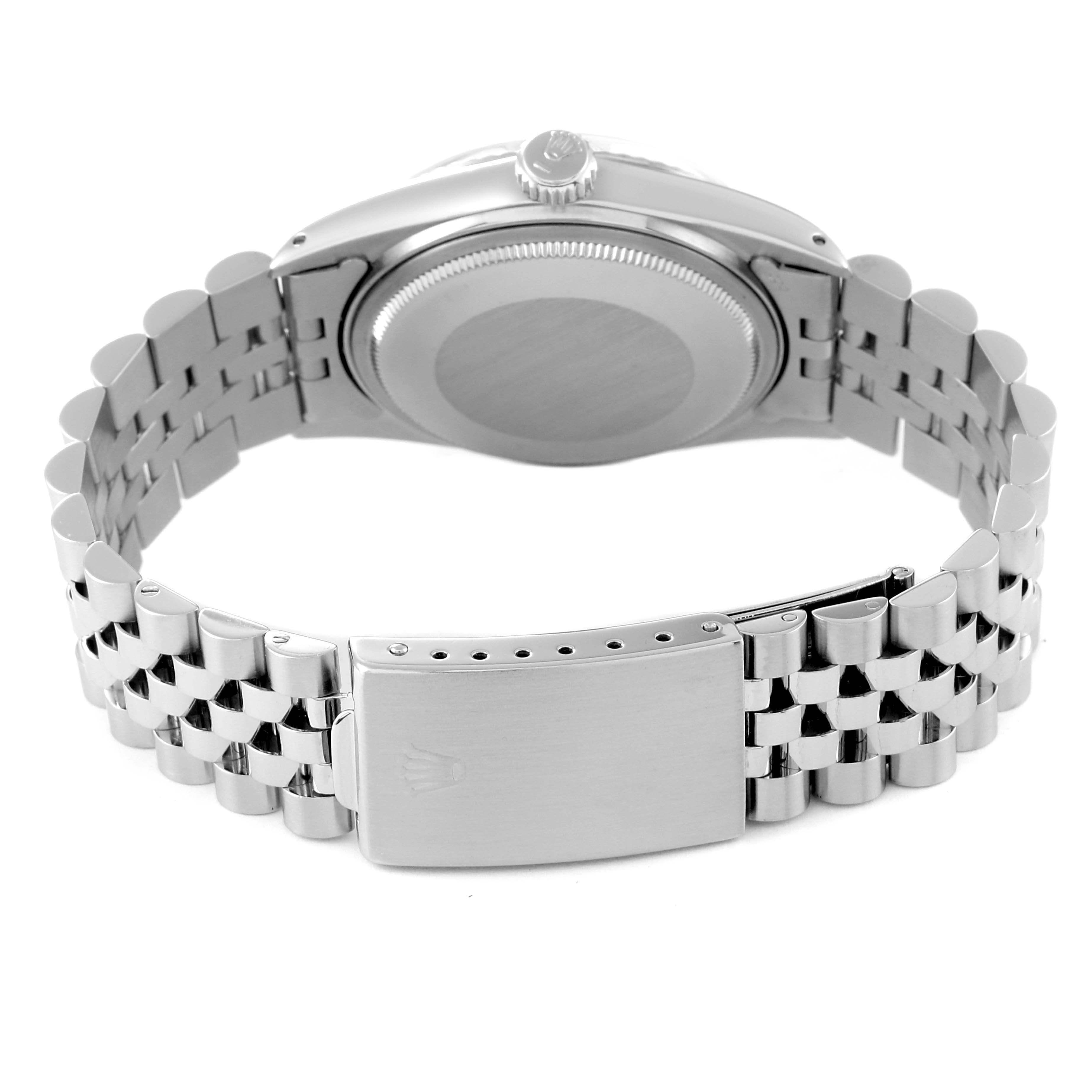 The image shows the back of a Rolex Datejust 16014 Men's Stainless Steel Blue Dial 16014 Men's Stainless Steel Blue Dial watch, including the case, crown, and metal bracelet.