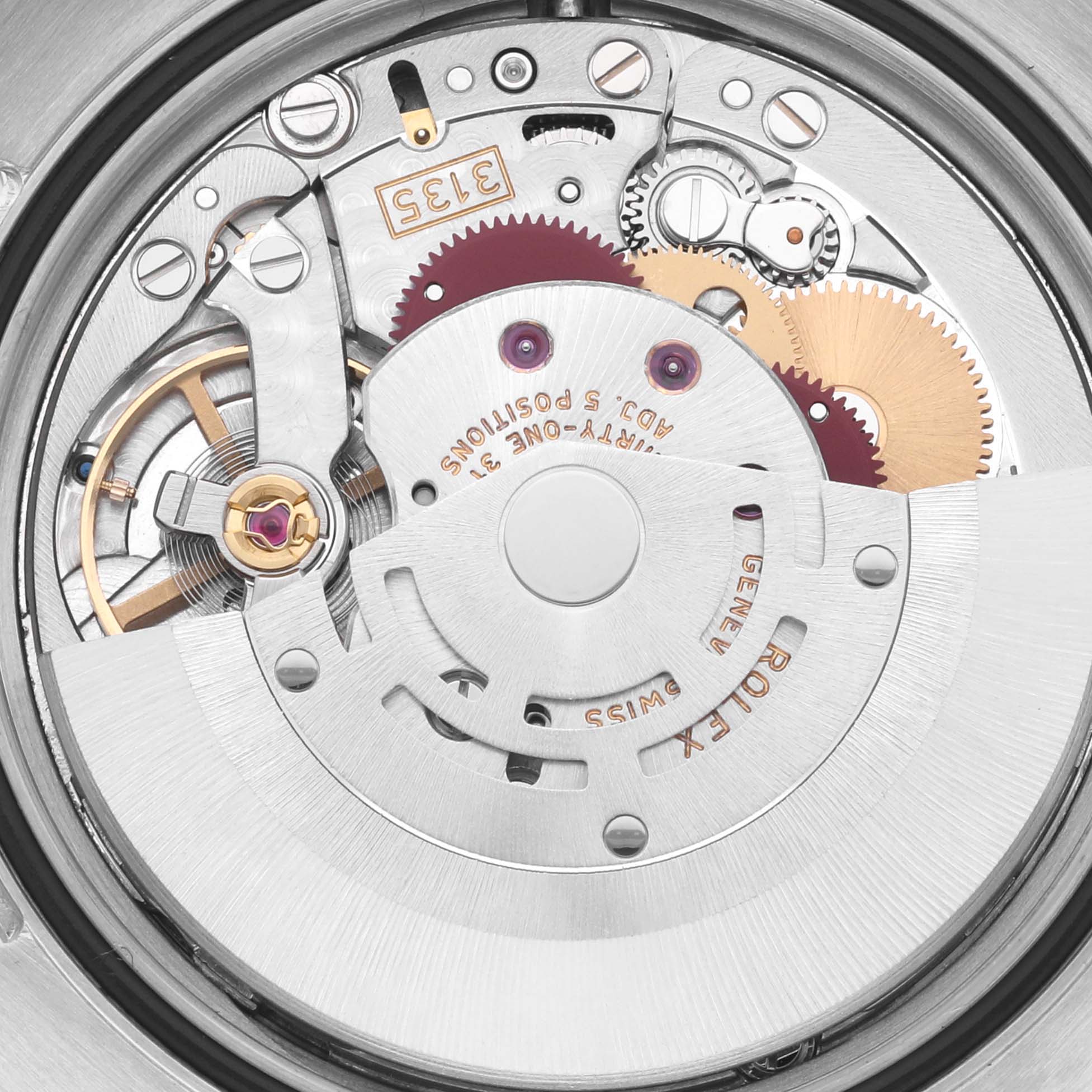 The image shows the intricate inner mechanism of the Rolex Datejust 116234 Men's Stainless Steel Silver Dial 116234 Men's Stainless Steel Silver Dial watch, highlighting gears and components from a top-down angle.