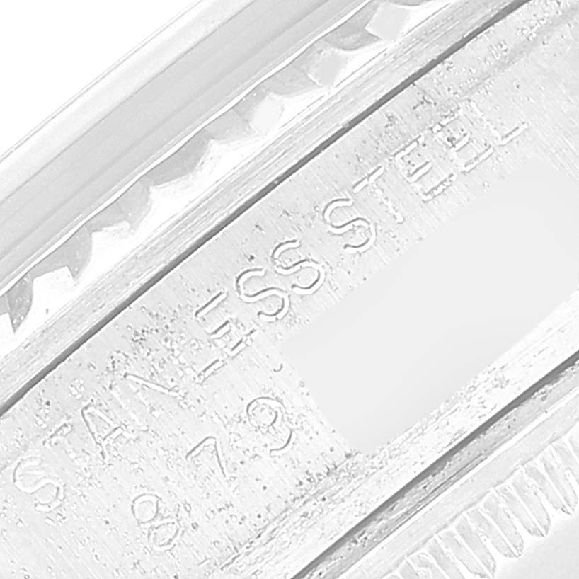 This close-up image displays the stainless steel marking on a Rolex Vintage Collection 16014 Men
s Stainless Steel Silver Dial 16014 Men
s Stainless Steel Silver Dial watch.