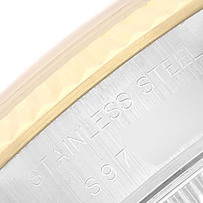 The image shows a close-up of the side of a Rolex Datejust 69173 Women's Steel and Gold (two tone) Beige Dial 69173 Women's Steel and Gold (two tone) Beige Dial watch, highlighting the stainless steel and yellow gold bezel.