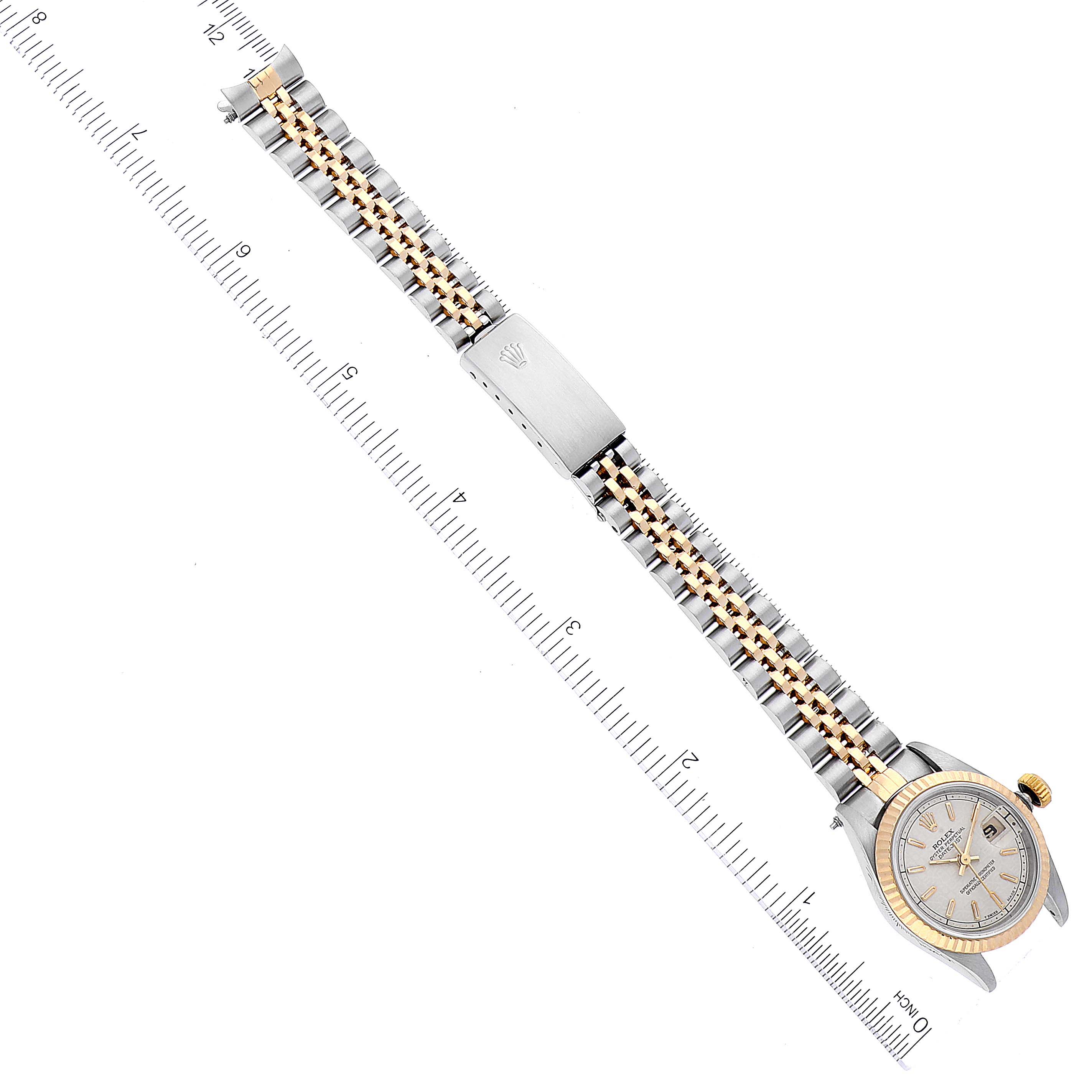 The image shows a Rolex Datejust 69173 Women's Steel and Gold (two tone) Beige Dial 69173 Women's Steel and Gold (two tone) Beige Dial watch laid flat, displaying its full bracelet, clasp, and face, aligned with a ruler for scale.