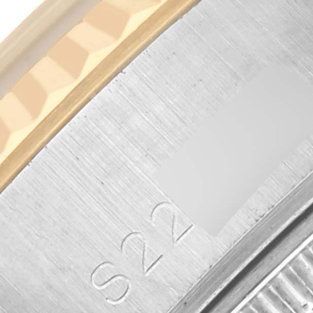 This image shows a close-up of the side of a Rolex Datejust 69173 Women's Steel and Gold (two tone) Black Dial 69173 Women's Steel and Gold (two tone) Black Dial watch, highlighting part of the bracelet and the edge of the case.
