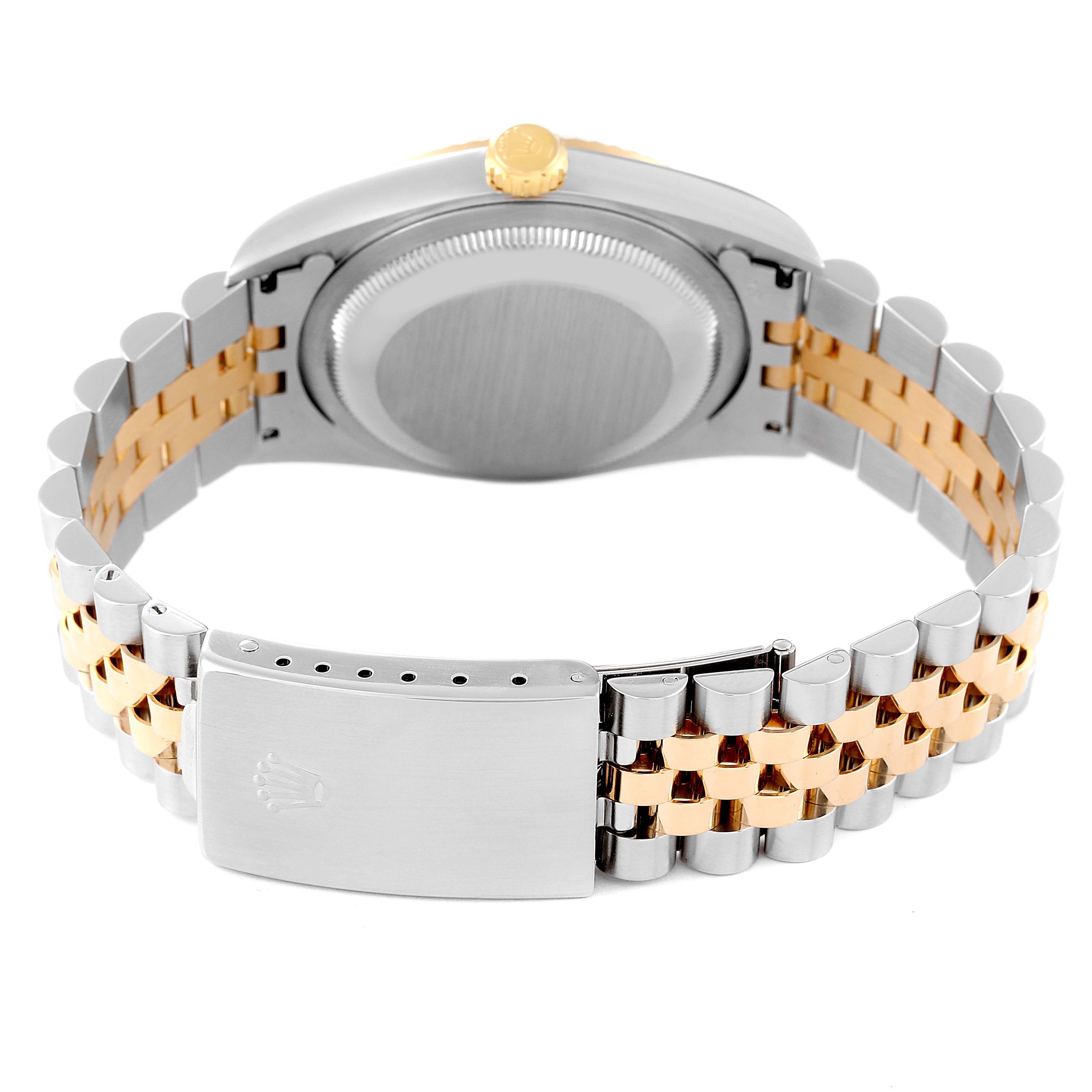 The image shows the back and bracelet of a Rolex Datejust 16233 Men's Steel and Gold (two tone) Black Dial 16233 Men's Steel and Gold (two tone) Black Dial watch, featuring a two-tone metal design and a clasp with the Rolex logo.