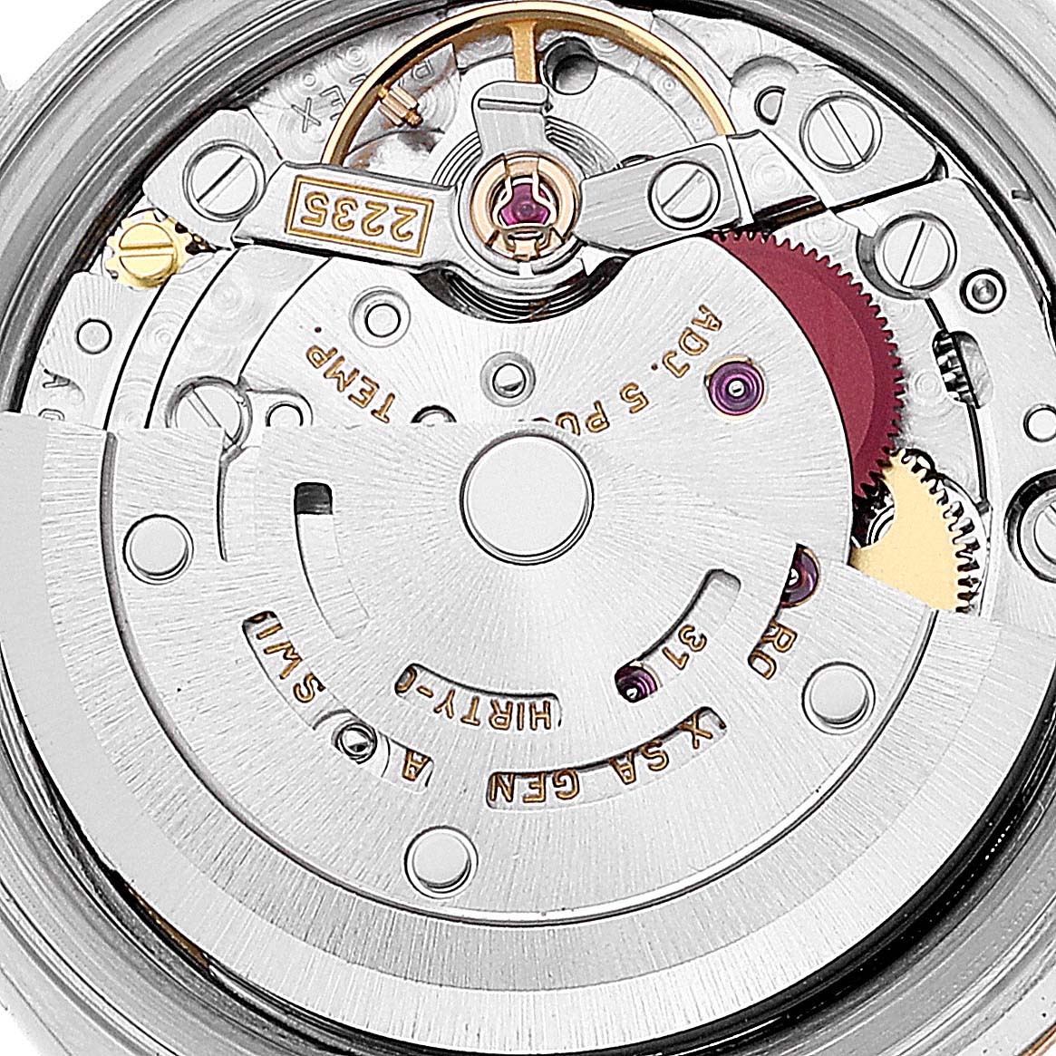 This is an angled close-up view of the mechanical movement inside a Rolex Datejust 79173 Women's Steel and Gold (two tone) Champagne Dial 79173 Women's Steel and Gold (two tone) Champagne Dial watch.